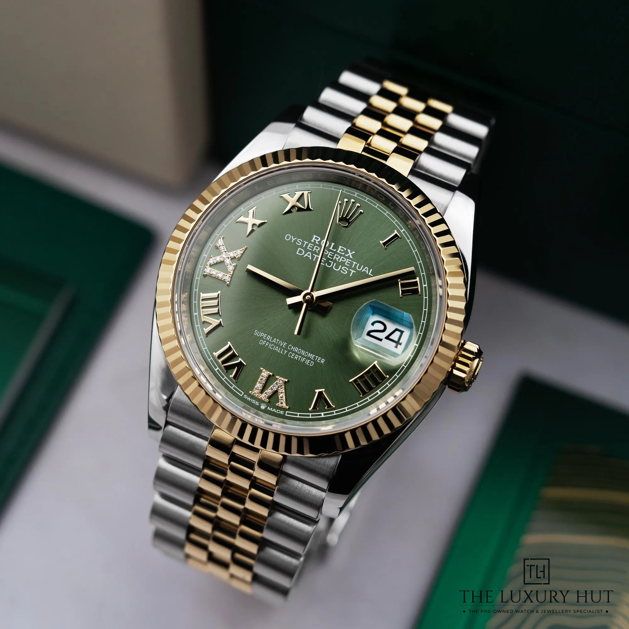 2026/03/fbfedc80-d81d-496a-a915-bad16bd66fabRolex_Datejust_36_Olive_Green_Roman_Diamond_52714-bb1.jpg.webp