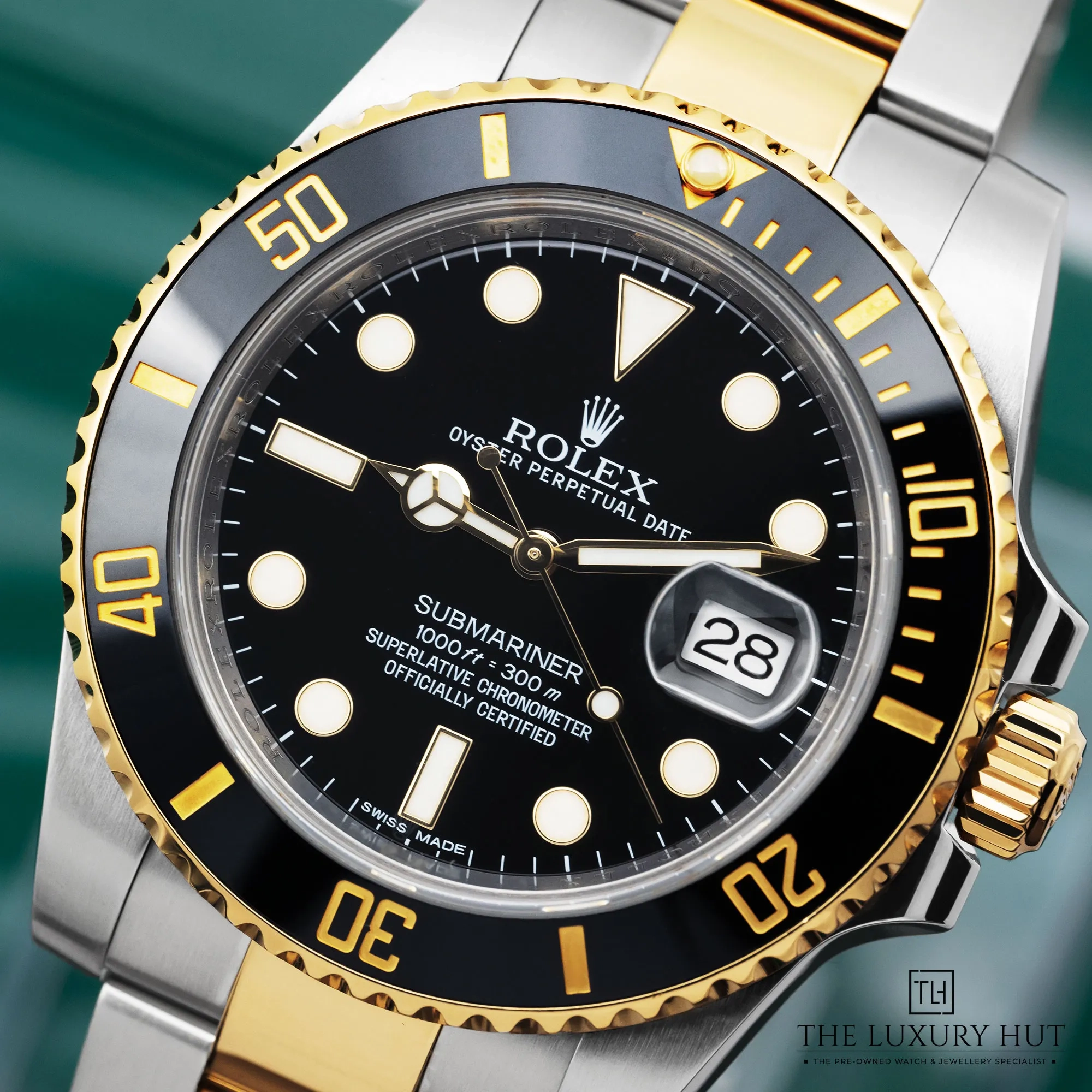 2026/04/409d18fa-b83d-4162-9e7e-b3df2f024b4dRolex_Submariner_Date_Bi-Metal_Black_Dial_52858-e.jpg.webp