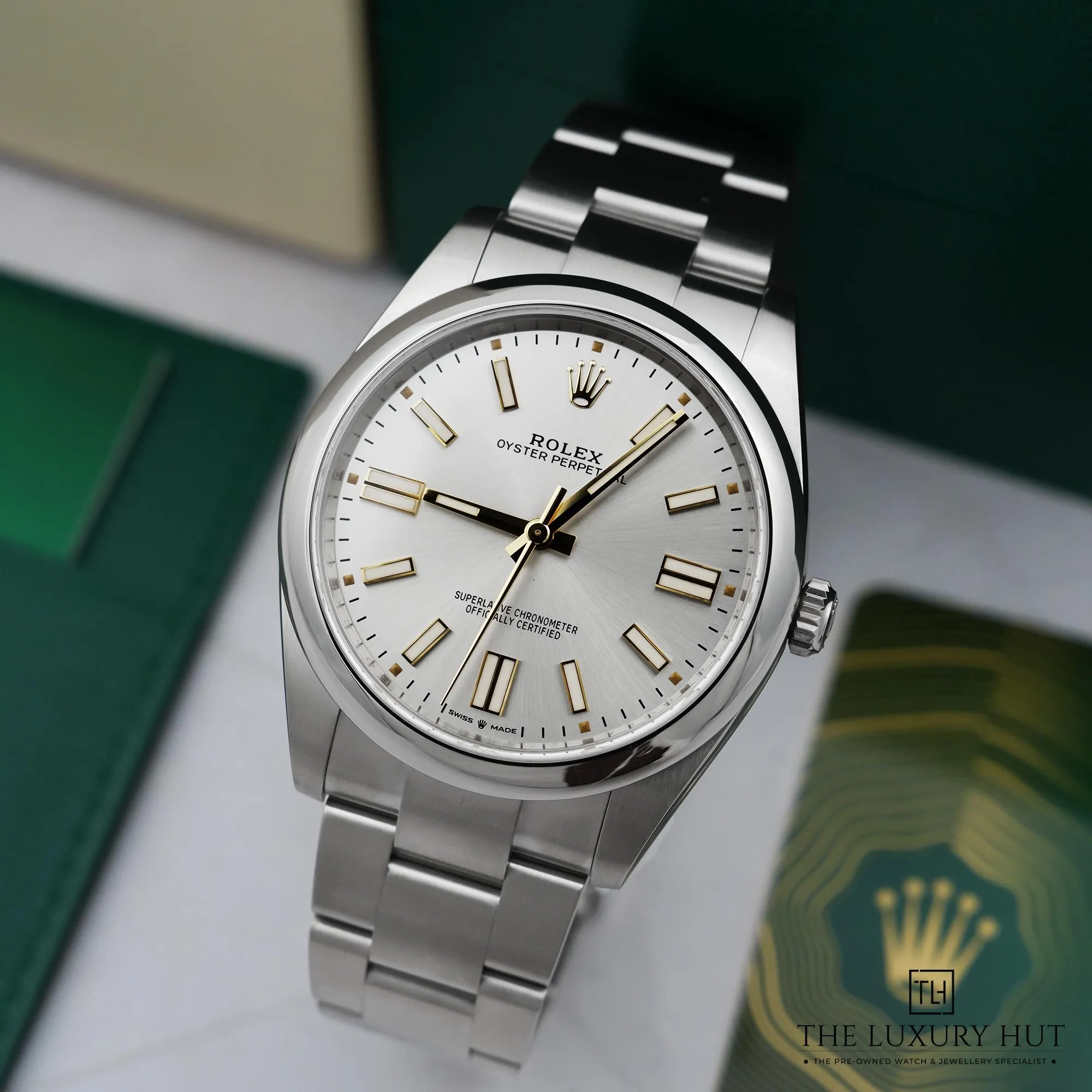 2026/04/5d0811ce-25d0-4e8b-a152-f9dc3148b87aRolex_Oyster_Perpetual_41_Steel_Silver_Dial_52870-b.jpg.webp