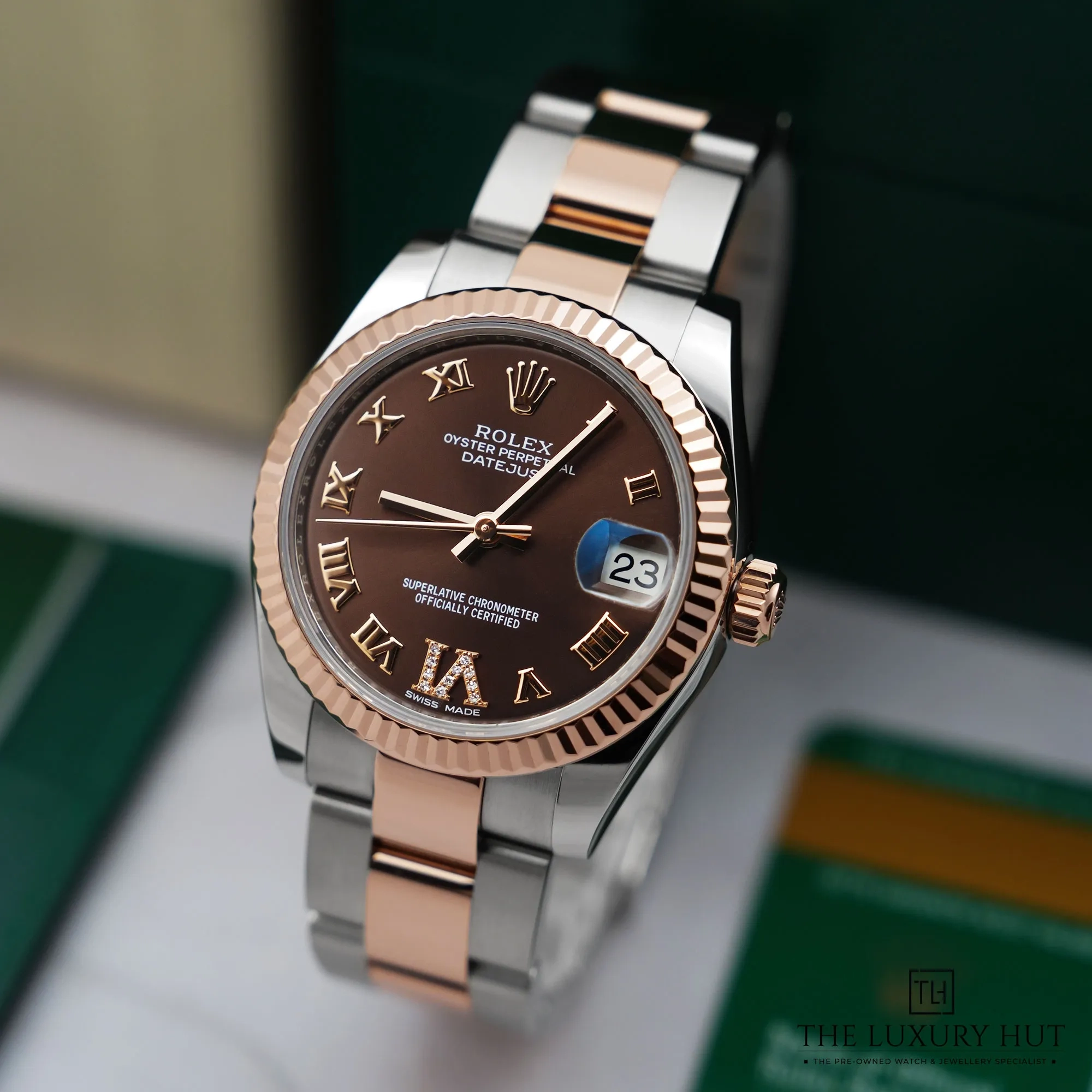 2026/04/9cfebce1-9673-40ae-a5d1-b5c77da2c49dRolex_Datejust_31mm_Bi-Metal_Chocolate_Diamond_LB867-b.jpg.webp