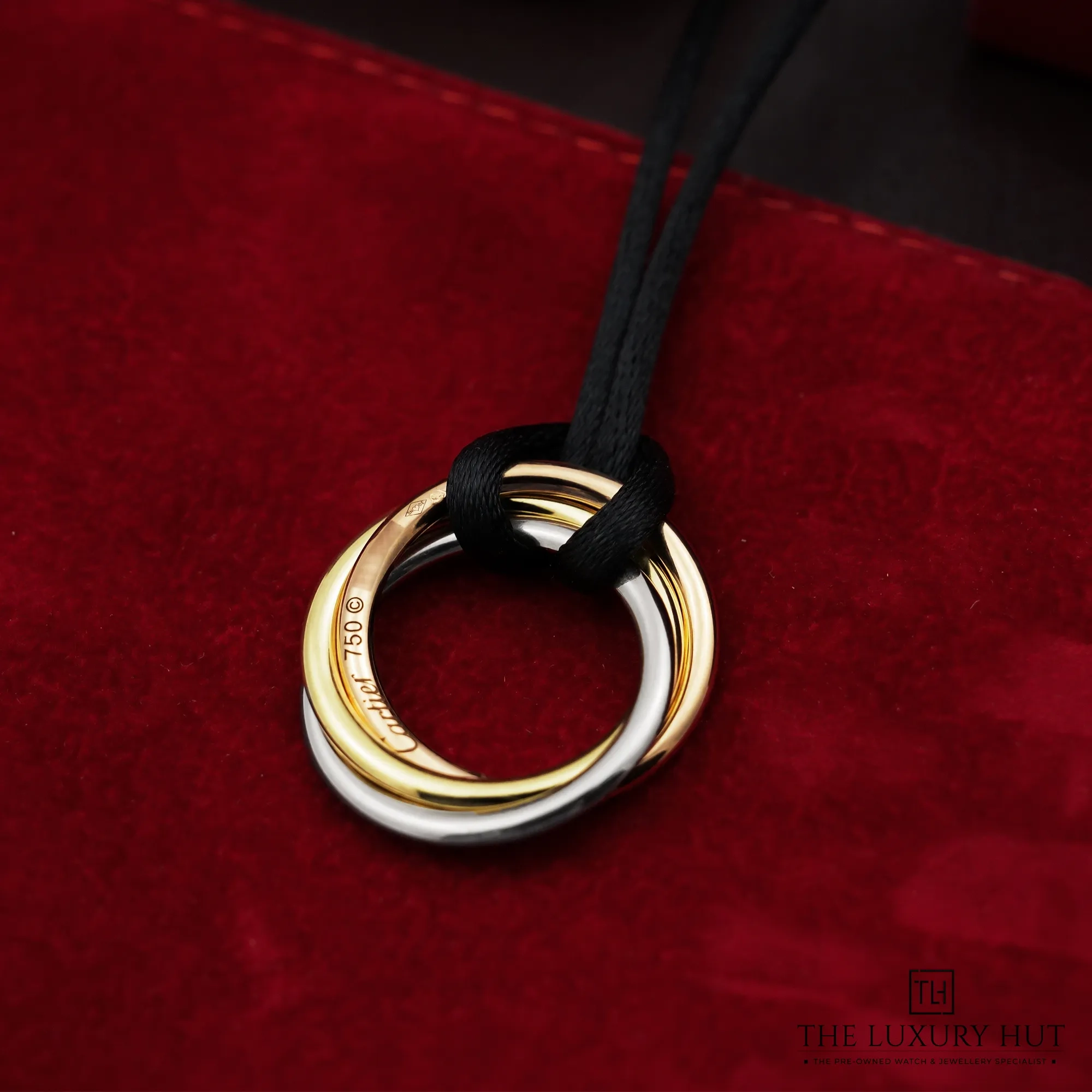 2026/04/9e8c7eea-af38-41ba-9fcf-53c72506955aCartier_Trinity_Black_Cord_Pendant_Necklace_52879-b.jpg.webp