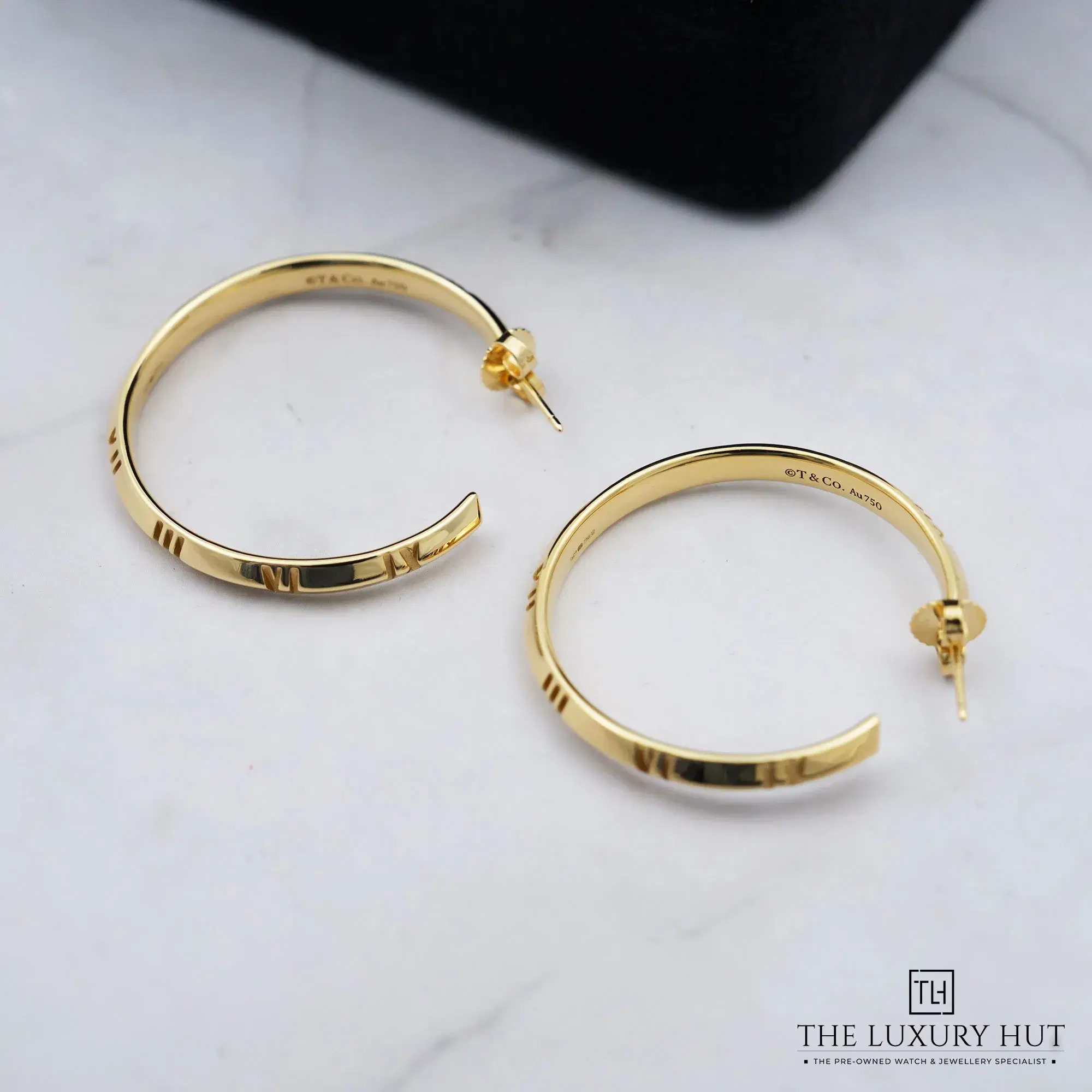2026/04/f30ce2dc-f946-45c4-b1bc-f0f9d88ee950Tiffany_Co_Yellow_Gold_Atlas__X_Hoop_Earrings_52890-c.jpg.webp