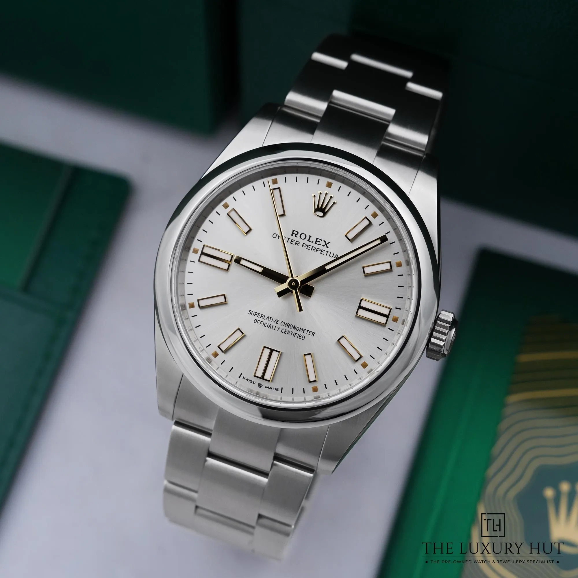 2026/05/86a2a8bf-5c19-445d-99b3-1a1c4a53eb2bRolex_Oyster_Perpetual_41mm_Steel_Silver_Dial_53010-b.jpg.webp