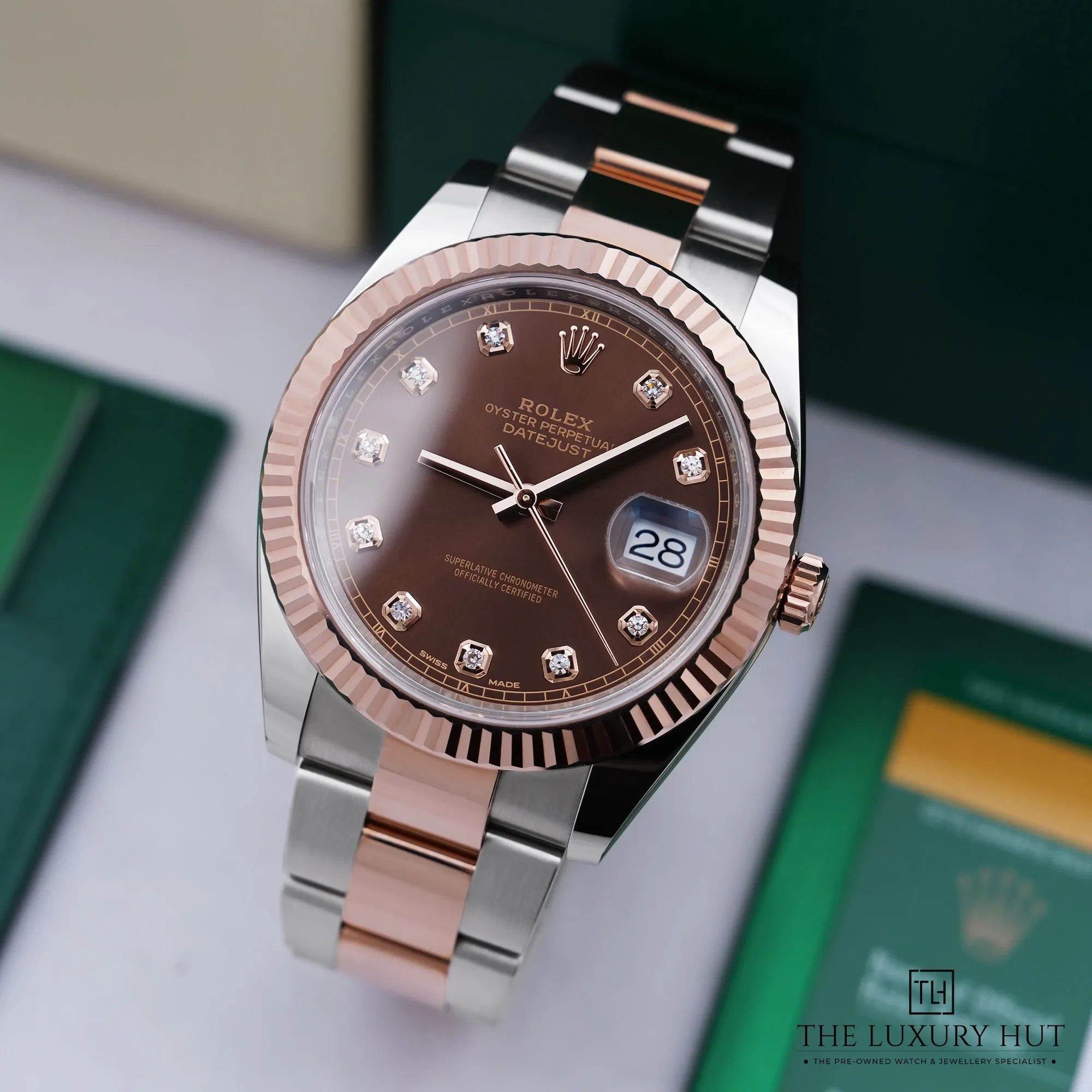 2026/05/bc71bfef-c8c8-405f-8e78-452dc0db0395Rolex_Datejust_Steel_Gold_41mm_Chocolate_Diamond_52930-bb.jpg.webp