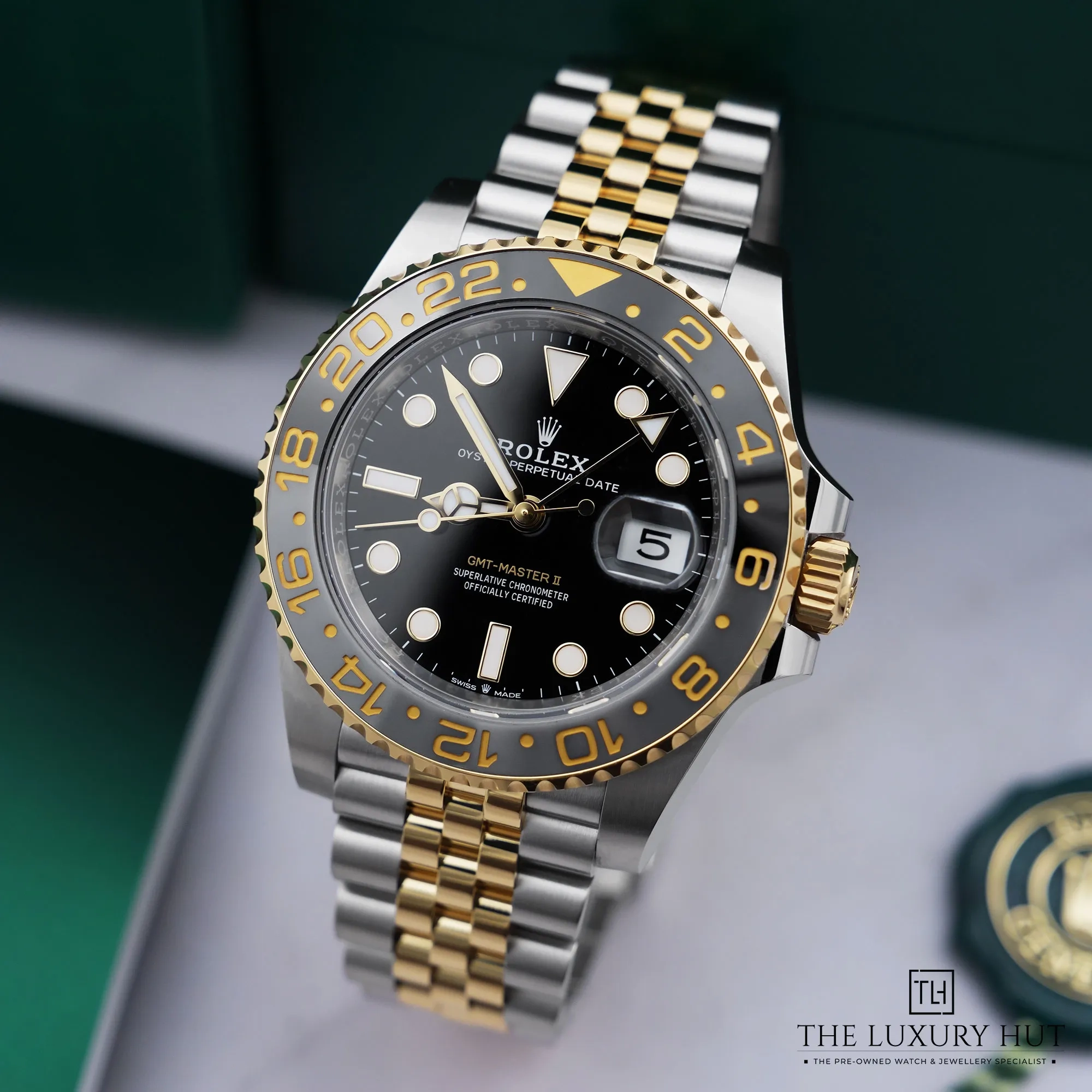 2026/05/e0118818-ac88-4d52-8b60-2cbd3b87cc56Rolex_GMT-Master_II_Steel_Gold_40mm_Black_LB883-b.jpg.webp