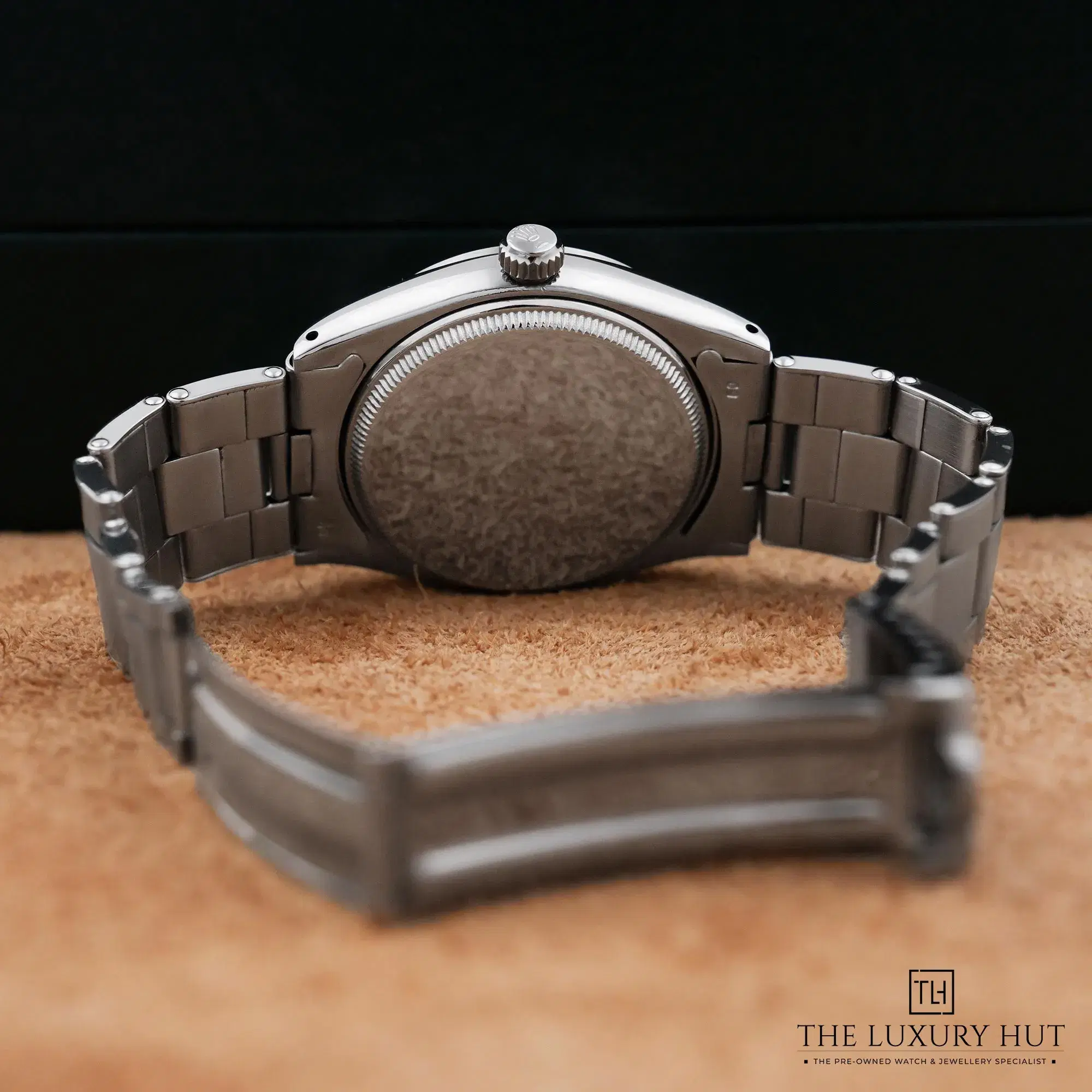 2026/06/04857b2e-458f-4fb9-8ae0-5a3253a9d703Rolex_Oyster_Date_Precision_Steel_34mm_White_52807-d.jpg.webp