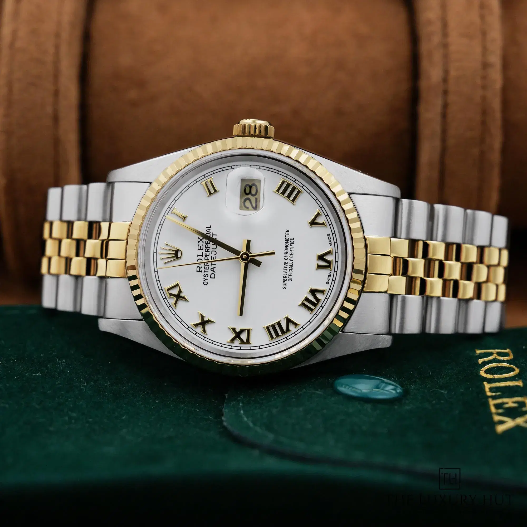 2026/06/c8571be7-86f4-4248-a41a-7bf20a5ec368Rolex_Datejust_36mm_White_Roman_Dial_52979-c.jpg.webp