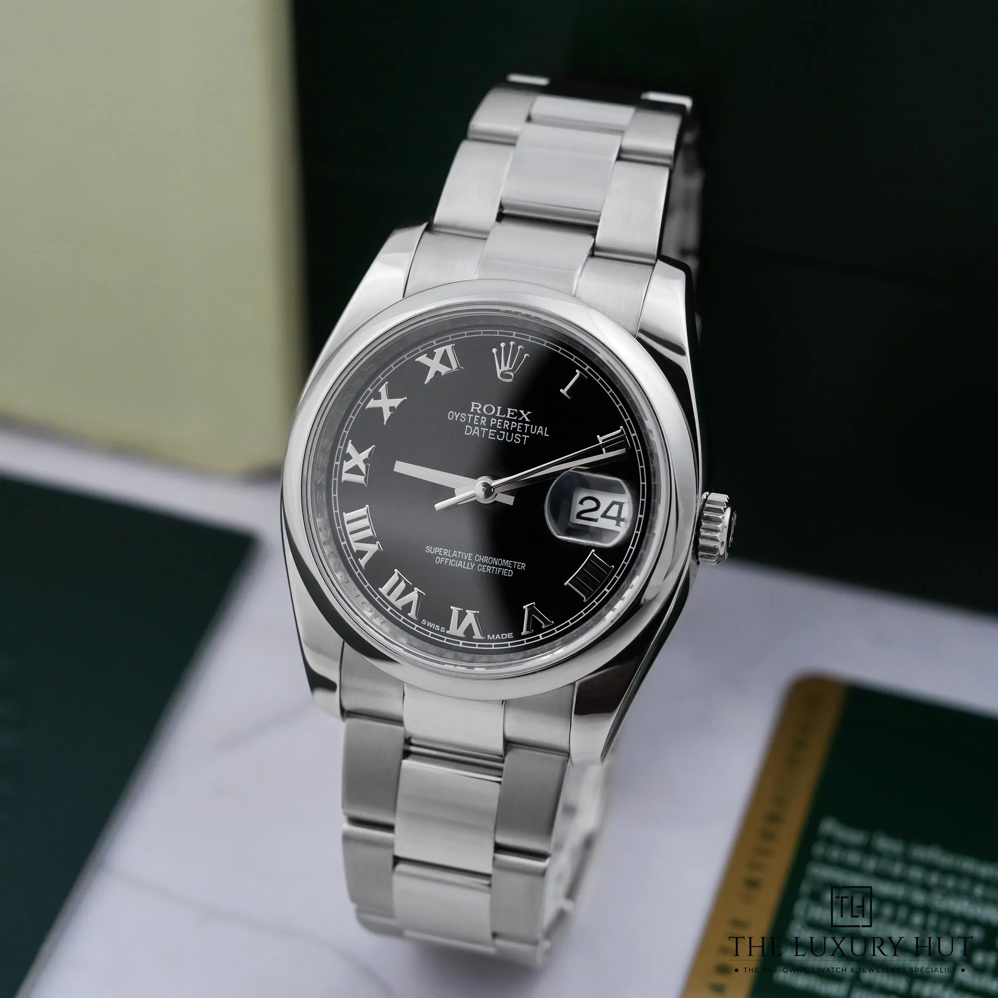 2026/06/f551e8e4-2e19-4e64-b845-fdd4d7e44429Rolex_Datejust_36_Steel_Black_Roman_52921-b.jpg.webp