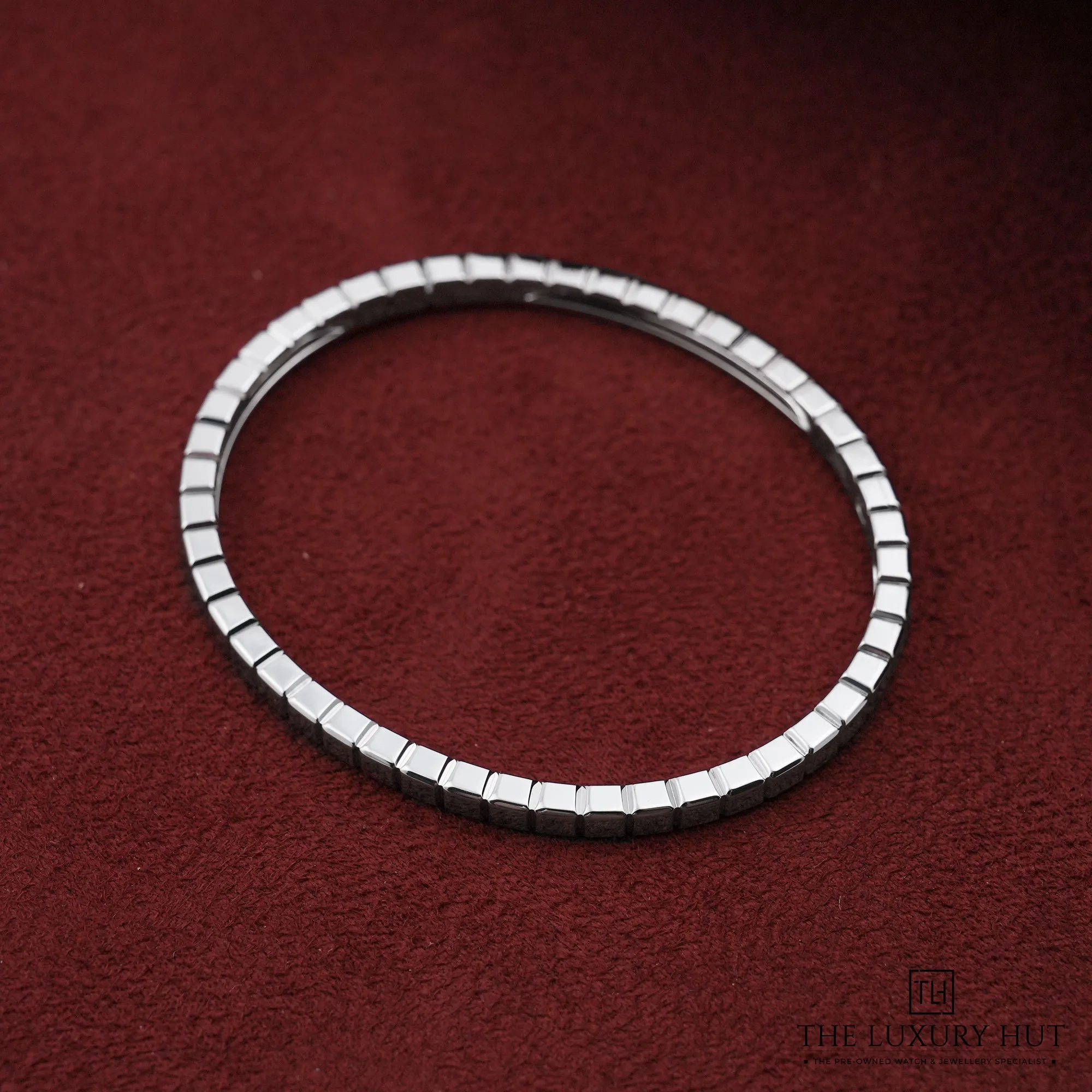 2026/07/2292168a-8992-4bdb-99e8-fa0b4ec7ac5aChopard_Ethical_White_Gold_Ice_Cube_Bangle_53212-b.jpg.webp