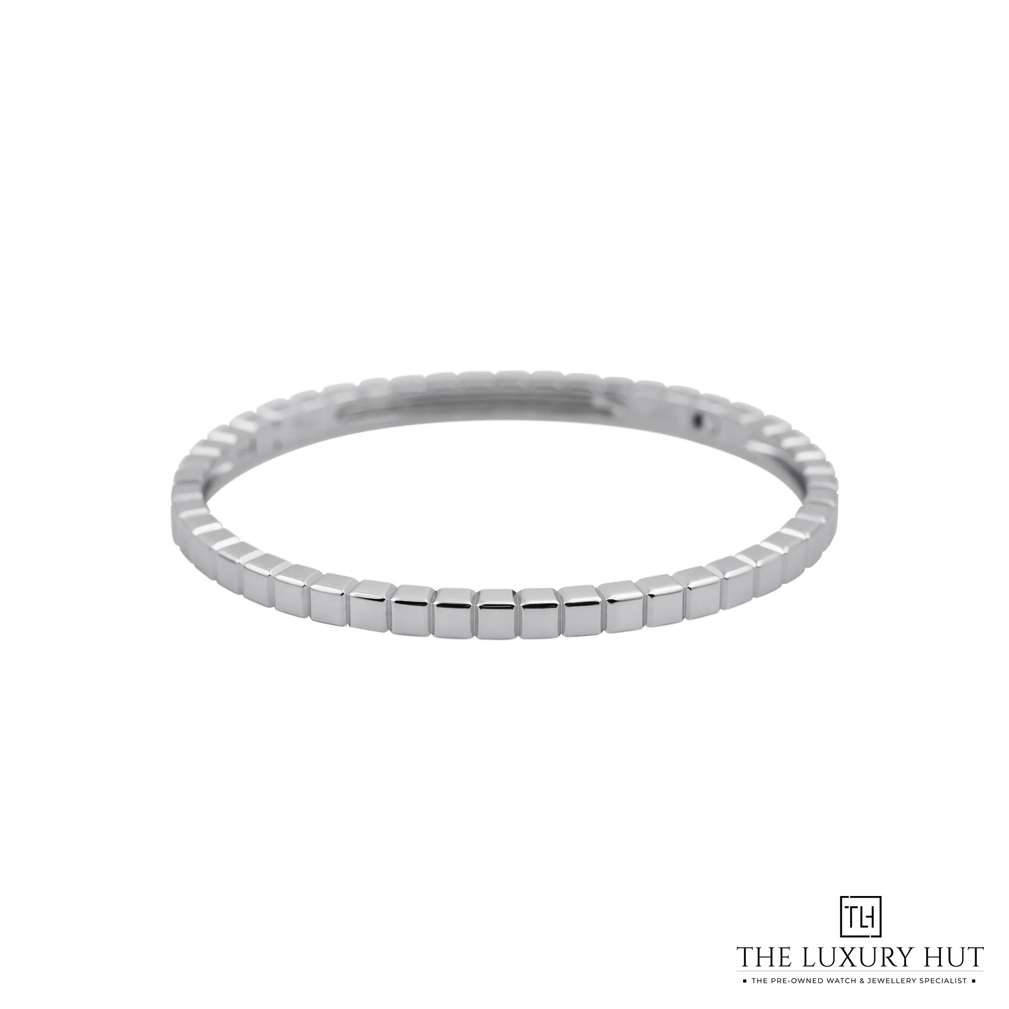 2026/07/77fb7f19-08b1-47e3-b361-6fa272bda9f0Chopard_Ethical_White_Gold_Ice_Cube_Bangle_53212-aa.jpg.webp