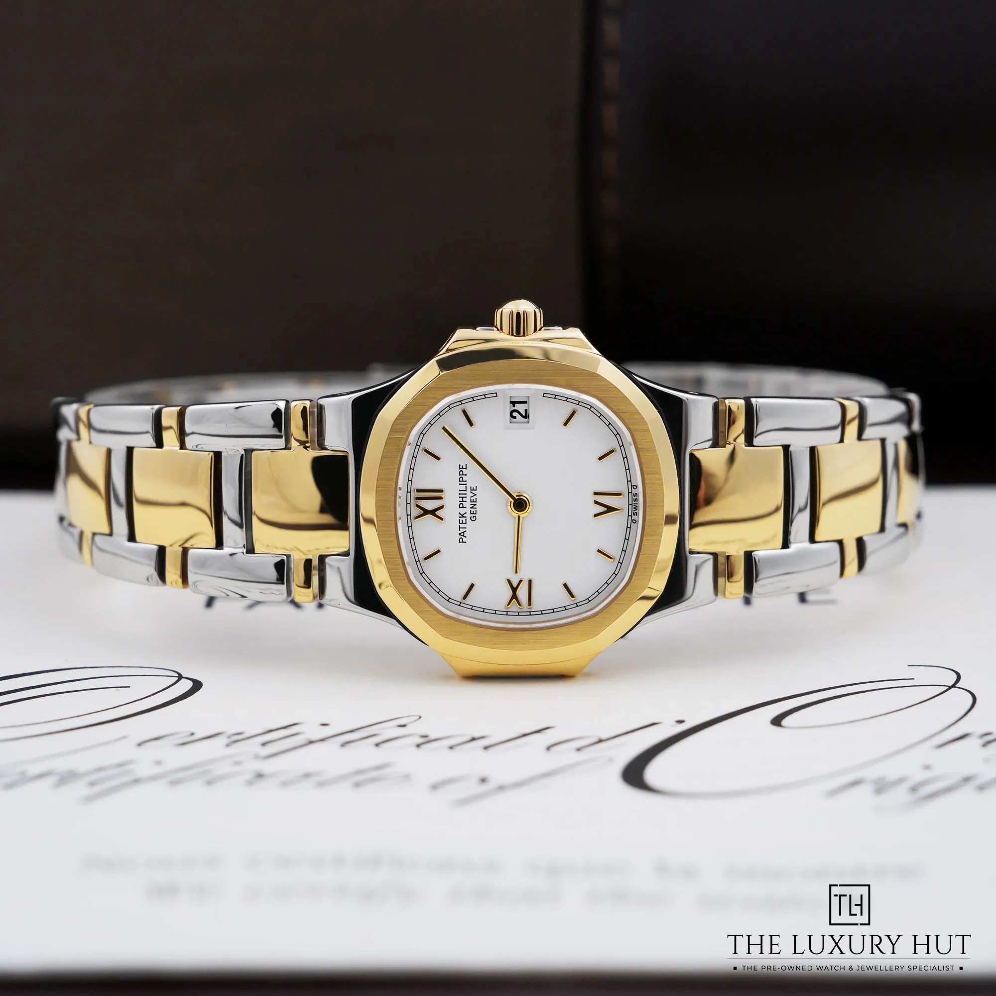 2026/08/17dd45e9-913f-49ea-b1de-dfd380b7c63fPatek_Philippe_Nautilus_Steel_Gold_27mm_White_53267-c.jpg.webp