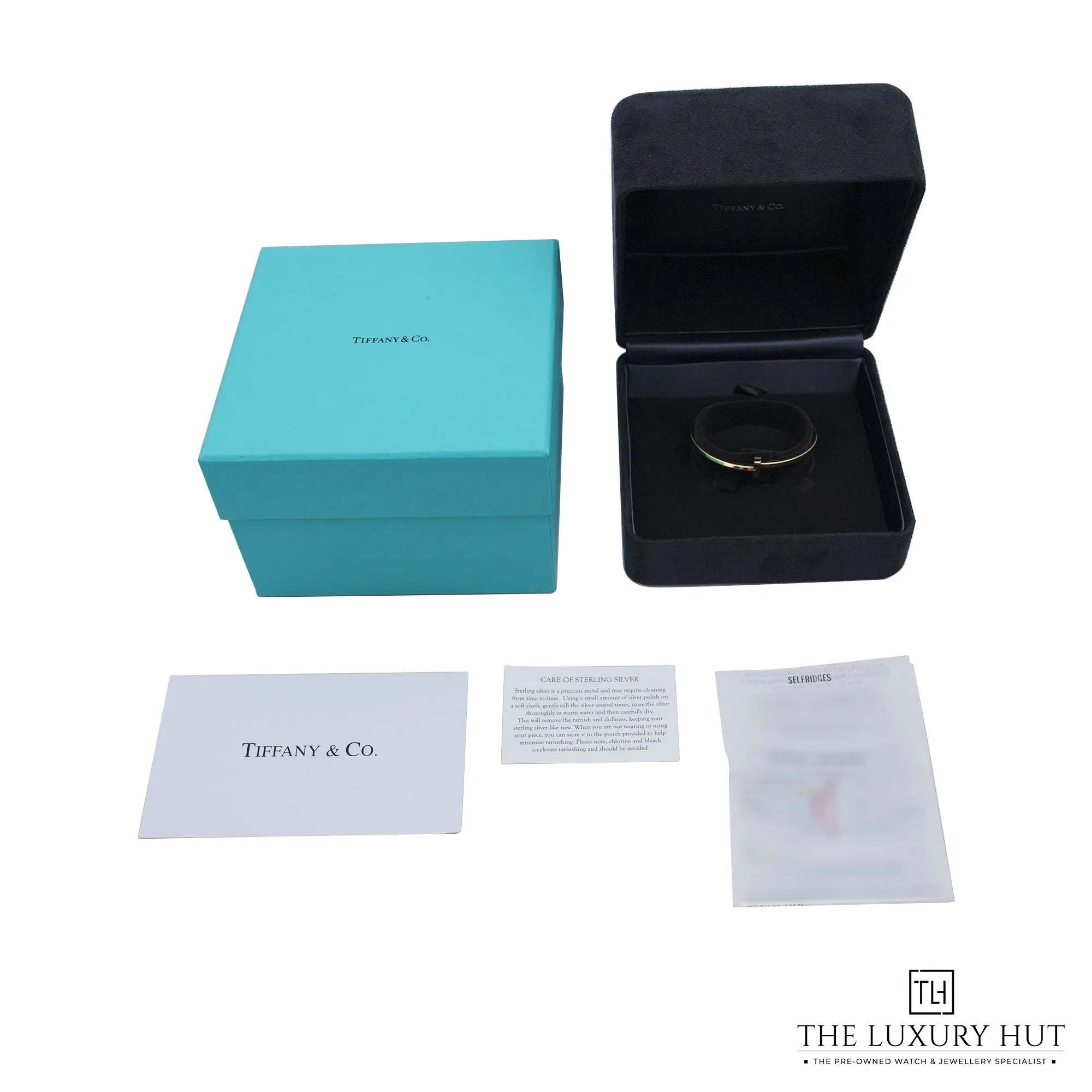 2026/08/d0a0e405-801a-4648-8199-d3b71f66a666Tiffany_T1_Yellow_Gold_Narrow_Hinged_Bangle_53000-e.jpg.webp