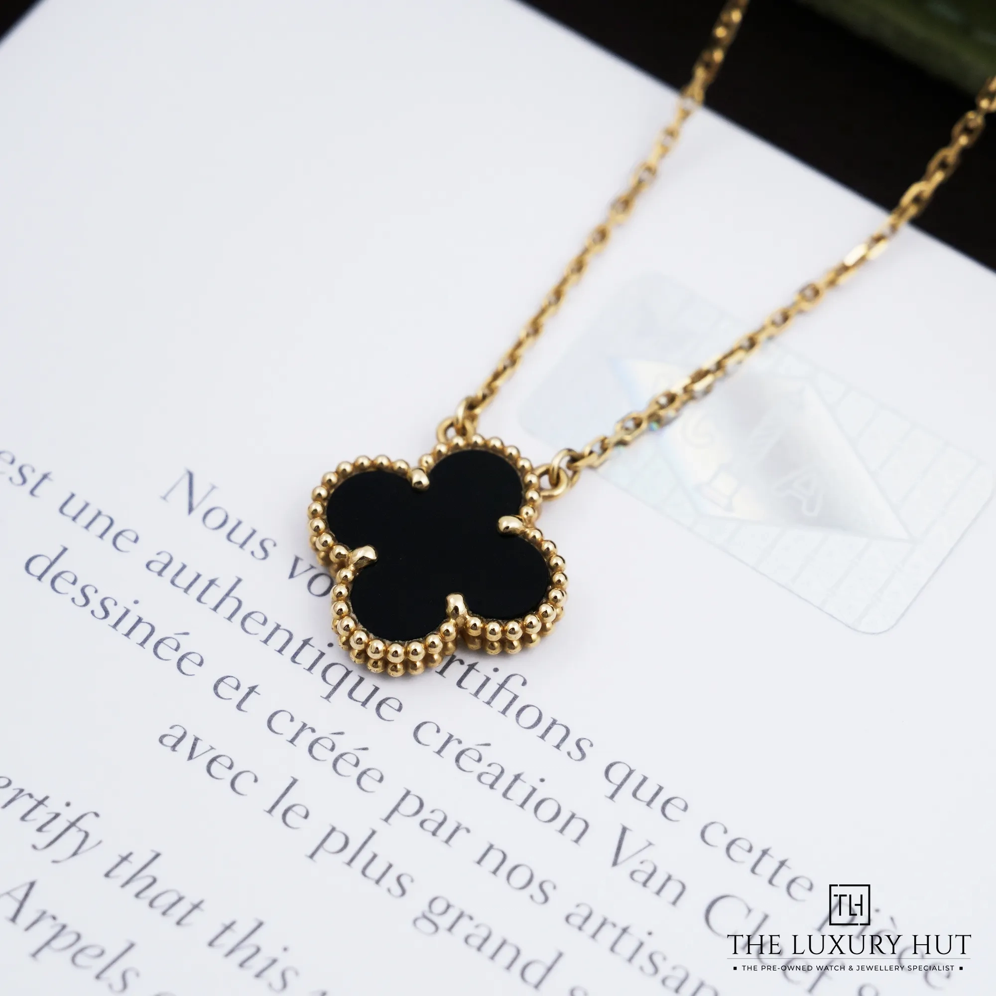 2026/08/e465bf95-23ce-432d-b5e7-4dcf852a535bVan_Cleef_Arpels_Yellow_Gold_Onyx_Pendant_Necklace_53273-c.jpg.webp