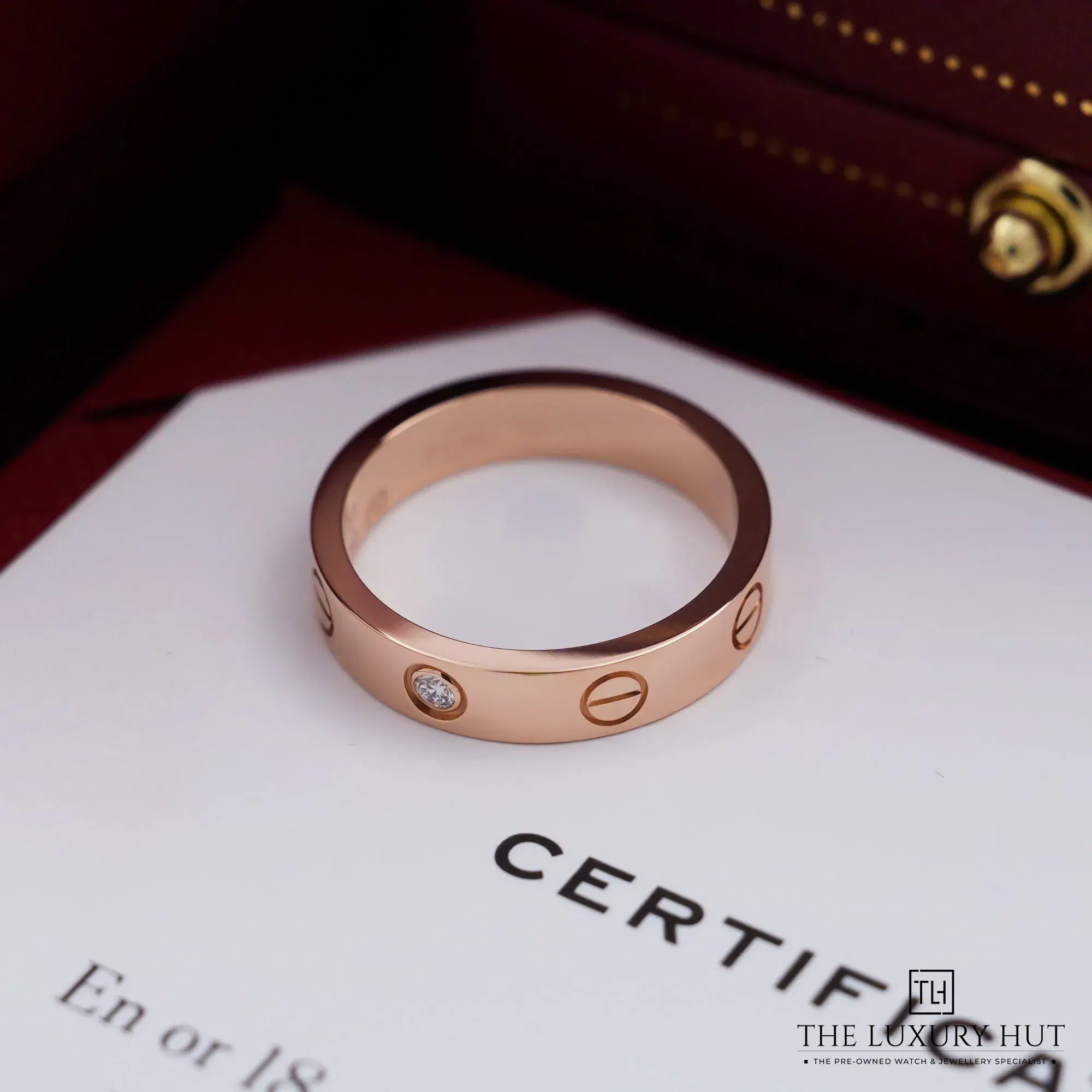 2026/09/1ccec848-a0f0-4f69-8460-4aa0d1000353Cartier_Rose_Gold_1_Diamond_Love_Ring_53353-b.jpg.webp