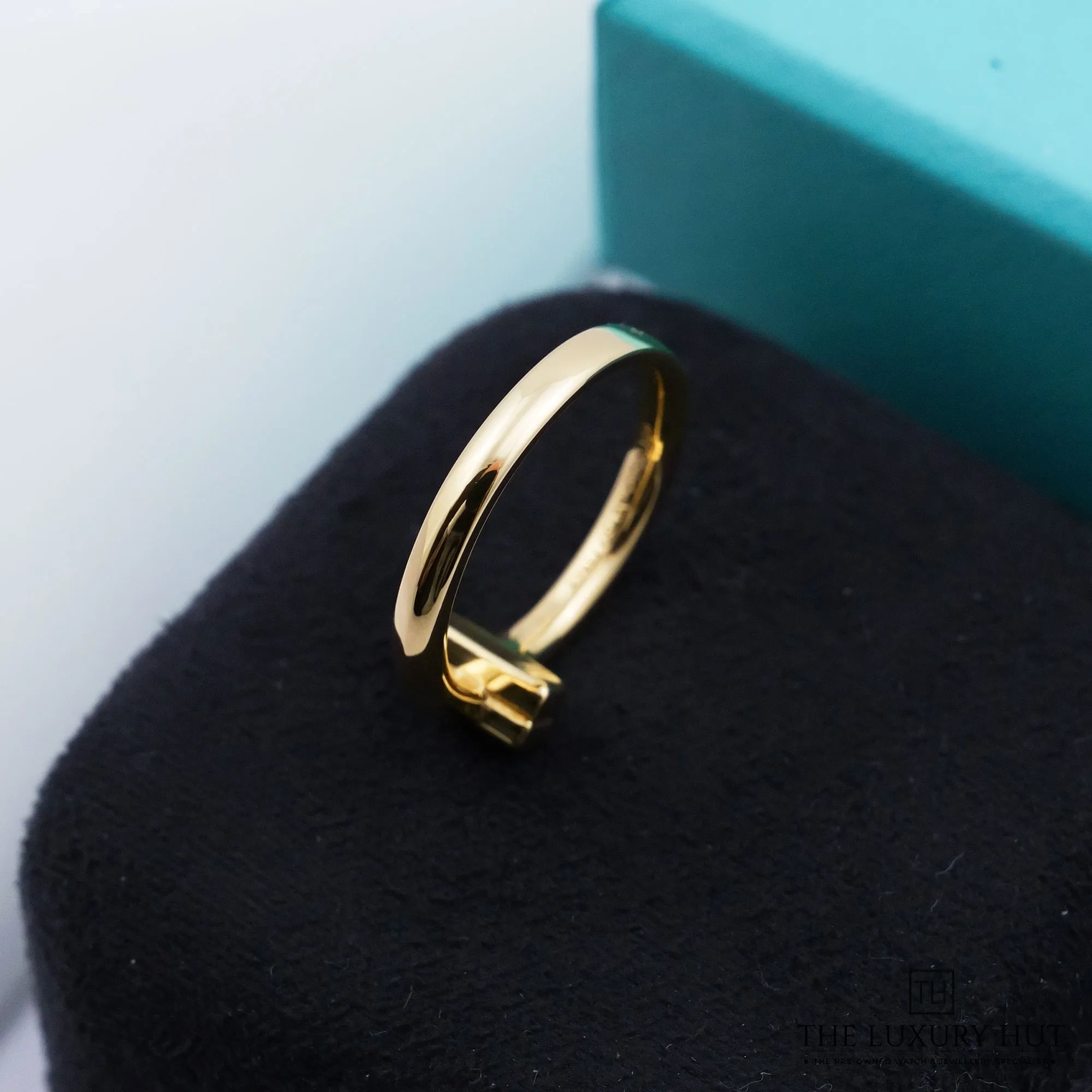 2026/09/5270c436-e30c-4335-97b0-7d823e22c7f4Tiffany_Yellow_Gold_Diamond_Tiffany_T1_Ring_53306-c.jpg.webp