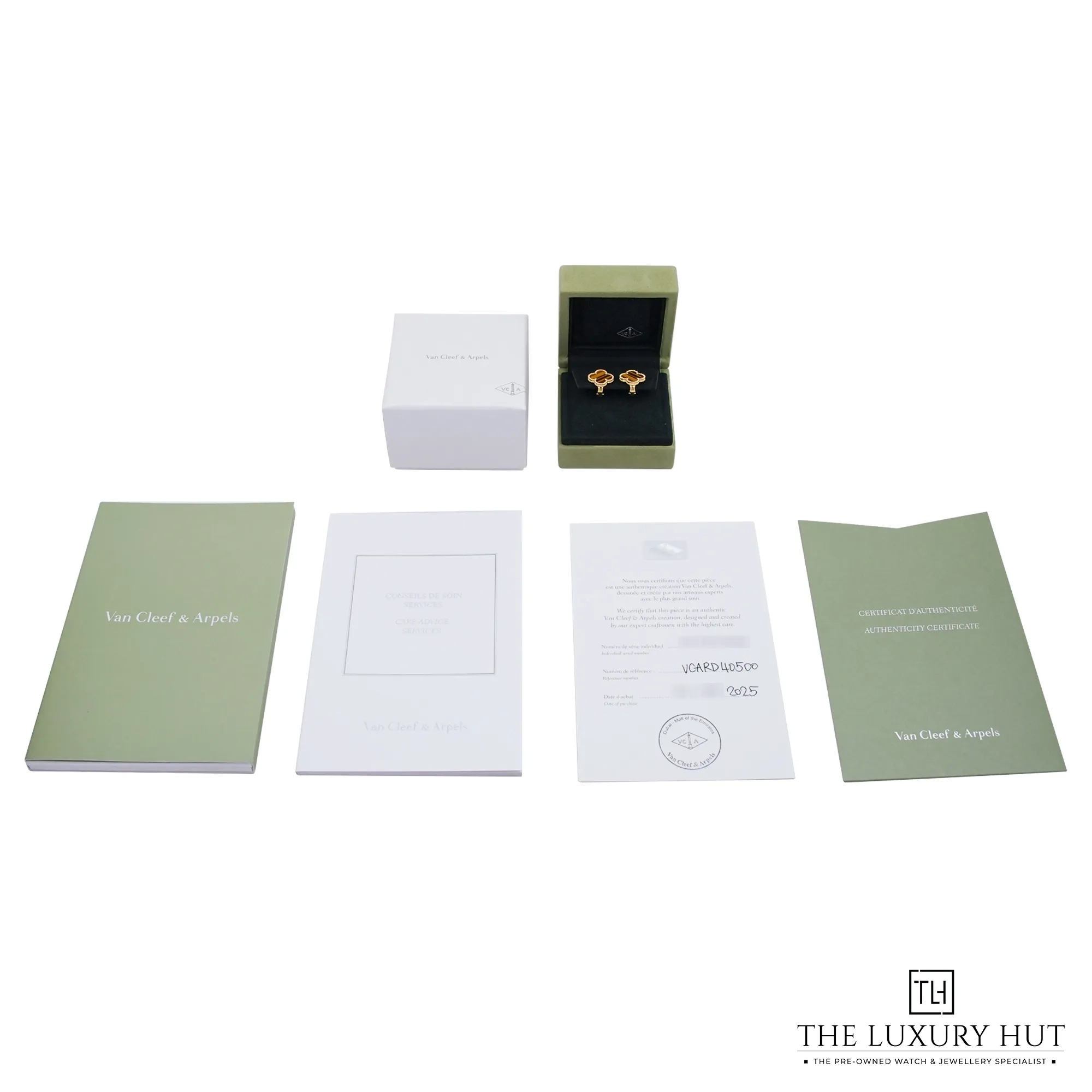 2026/09/7422ead7-141a-4a19-b71c-e221fadf83daVan_Cleef_&_Arpels_Yellow_Gold_Tiger_Ey_Ear_Rings_53393-e.jpg.webp