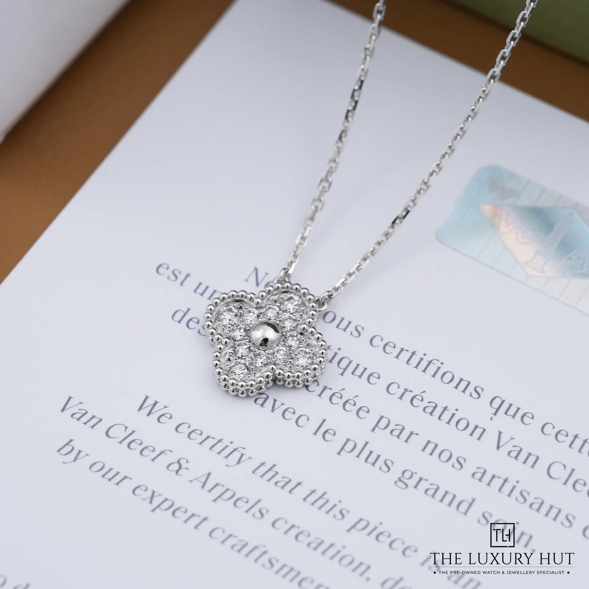 2026/09/bbe9c9b7-2d47-4042-8859-53603465c452Van_Cleef_&_Arpels_Vintage_Alhambra_White_Gold_Diamonds_Necklace_53392-c.jpg.webp