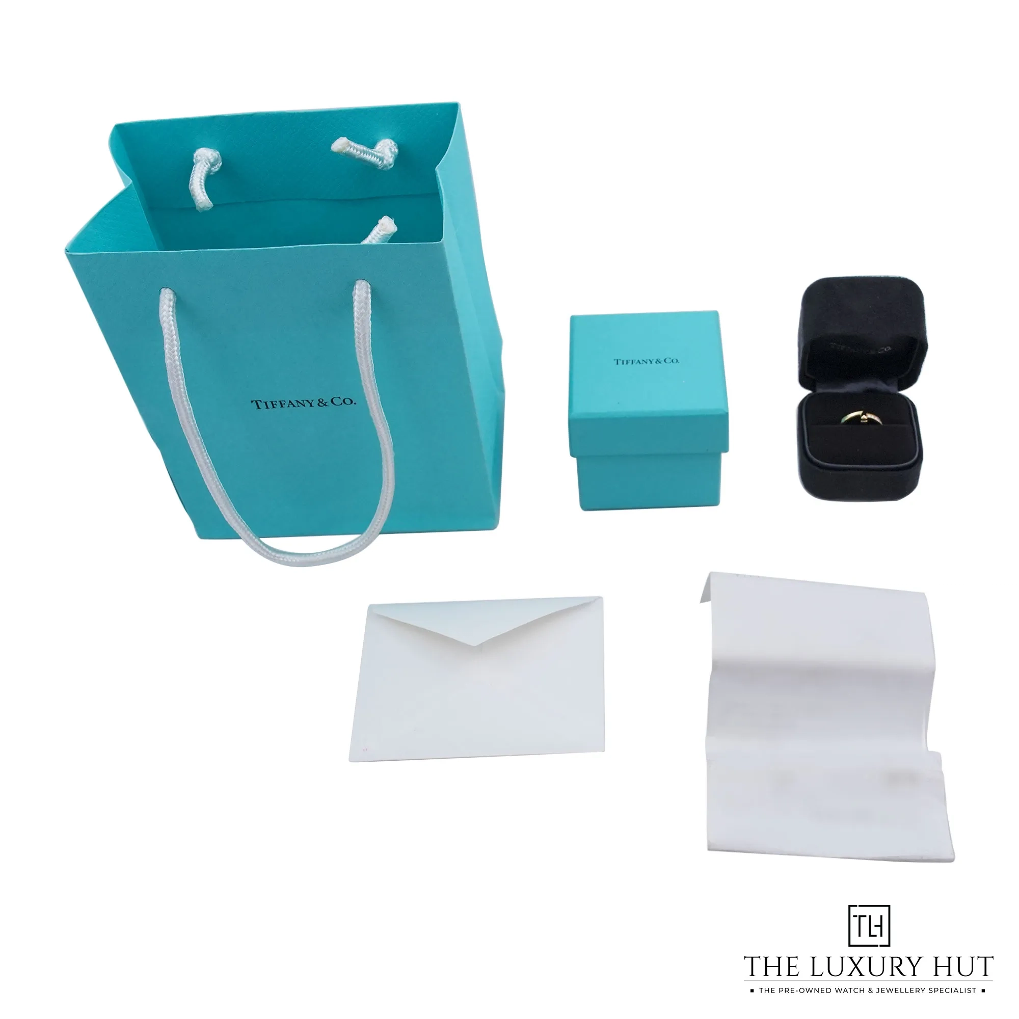 2026/09/c4f22fc8-359e-4945-91ef-f18c3905be50Tiffany_Yellow_Gold_Diamond_Tiffany_T1_Ring_53306-d.jpg.webp