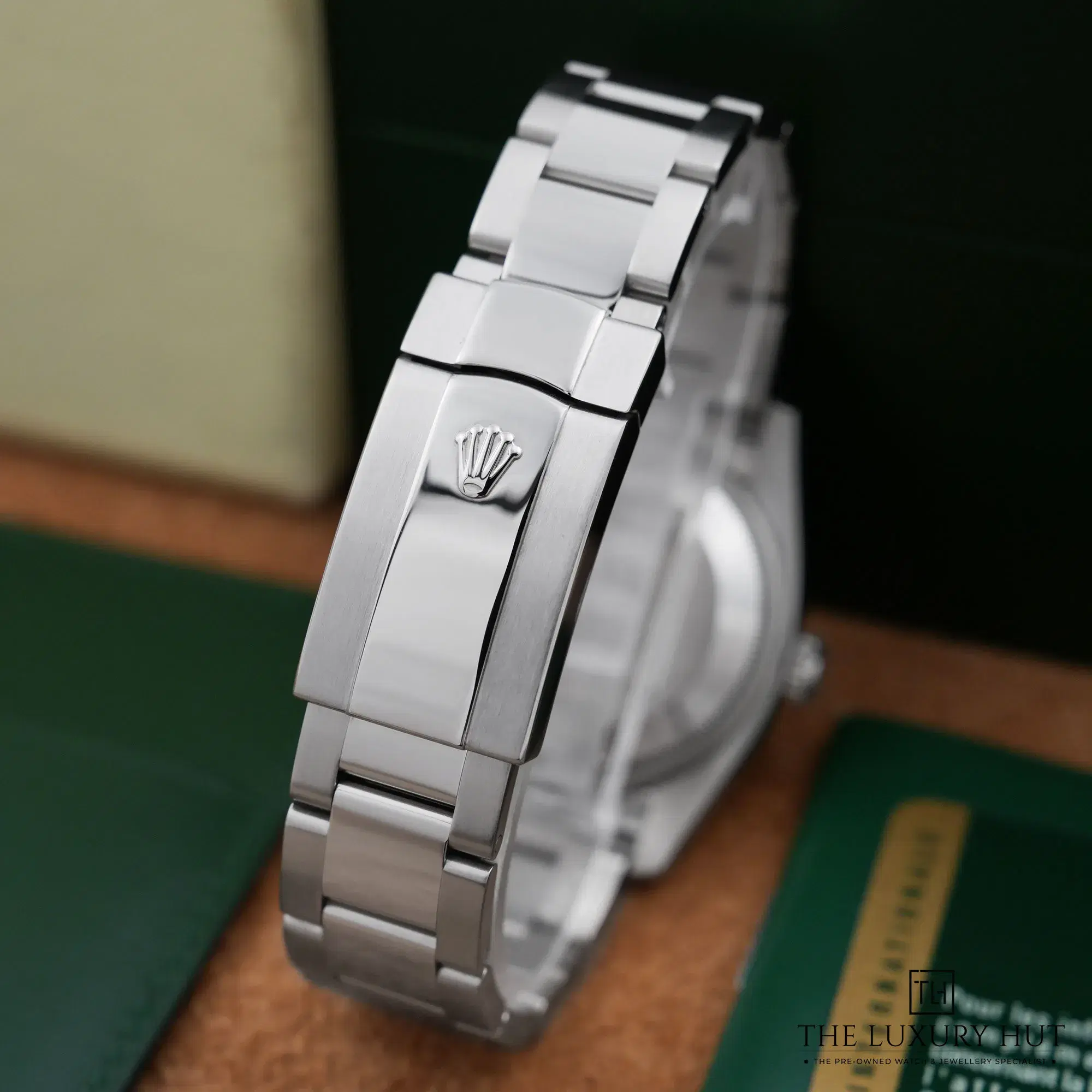 2026/10/178b0a58-ecbf-4481-b05c-1076daff56ffRolex_Oyster_Perpetual_Date_Stainless_Steel_34mm_Silver_Baton_53415-d.jpg.webp