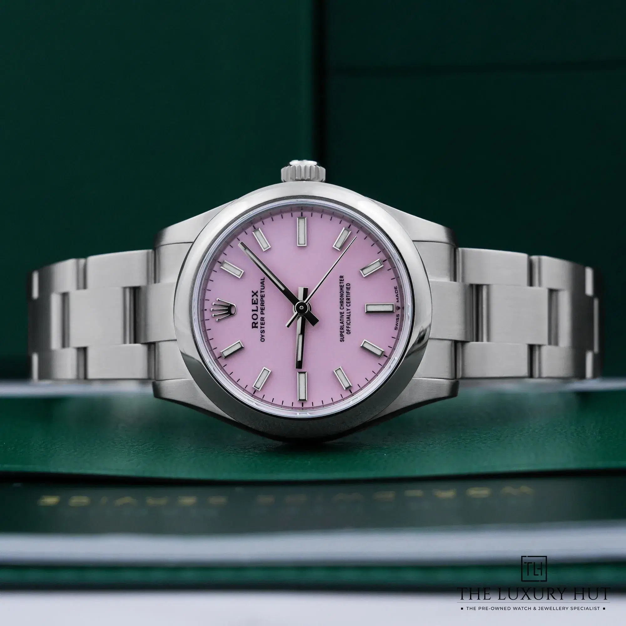 2026/10/41cfe061-7404-41b4-9a9f-0f0c5f7261a9Rolex_Oyster_Perpetual_31mm_Steel_Candy_Pink_53463-c.jpg.webp