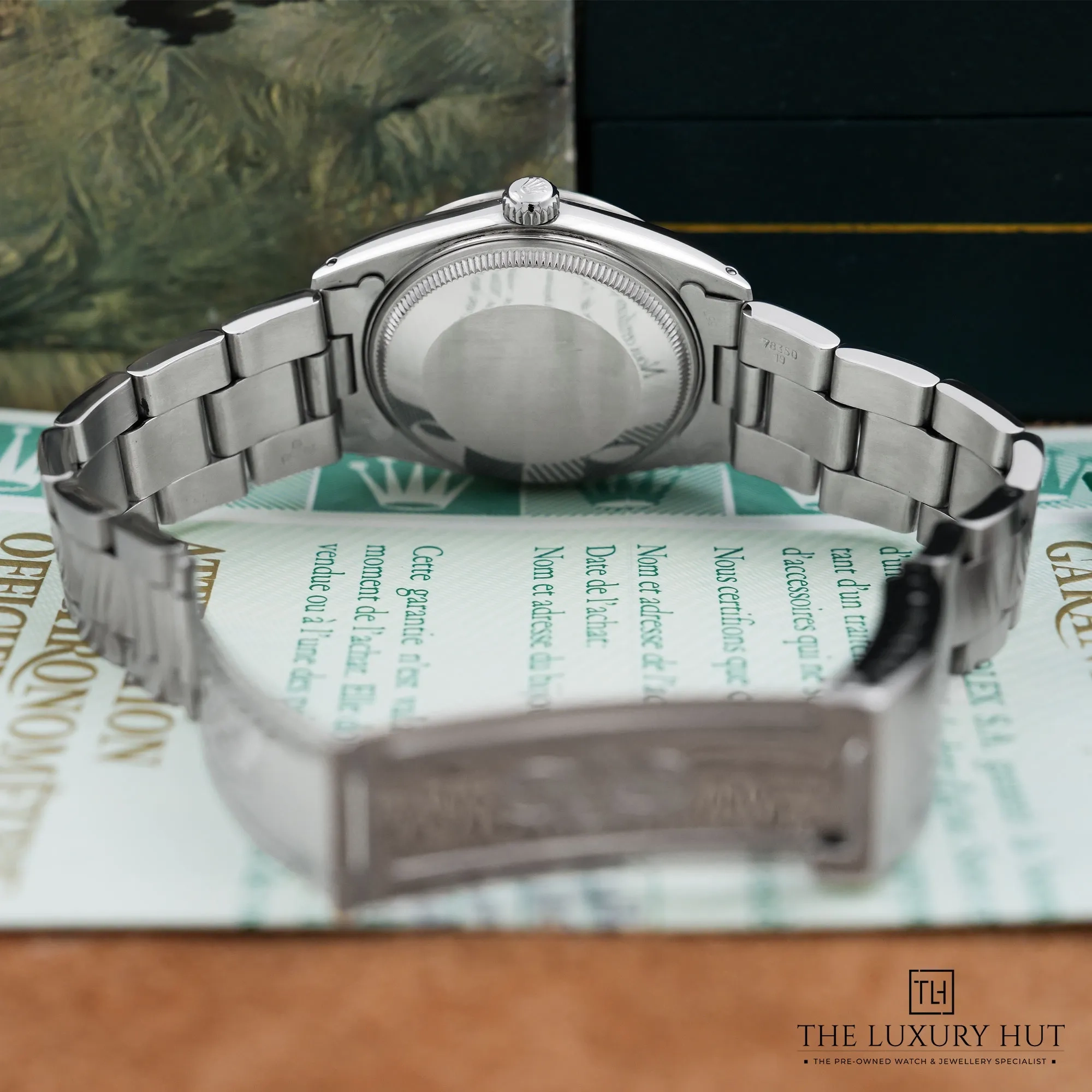 2026 10 48a5393a 77de 4825 9d58 58d976bb4d3aRolex Oyster Perpetual Date Steel White LB1056 d jpg webp