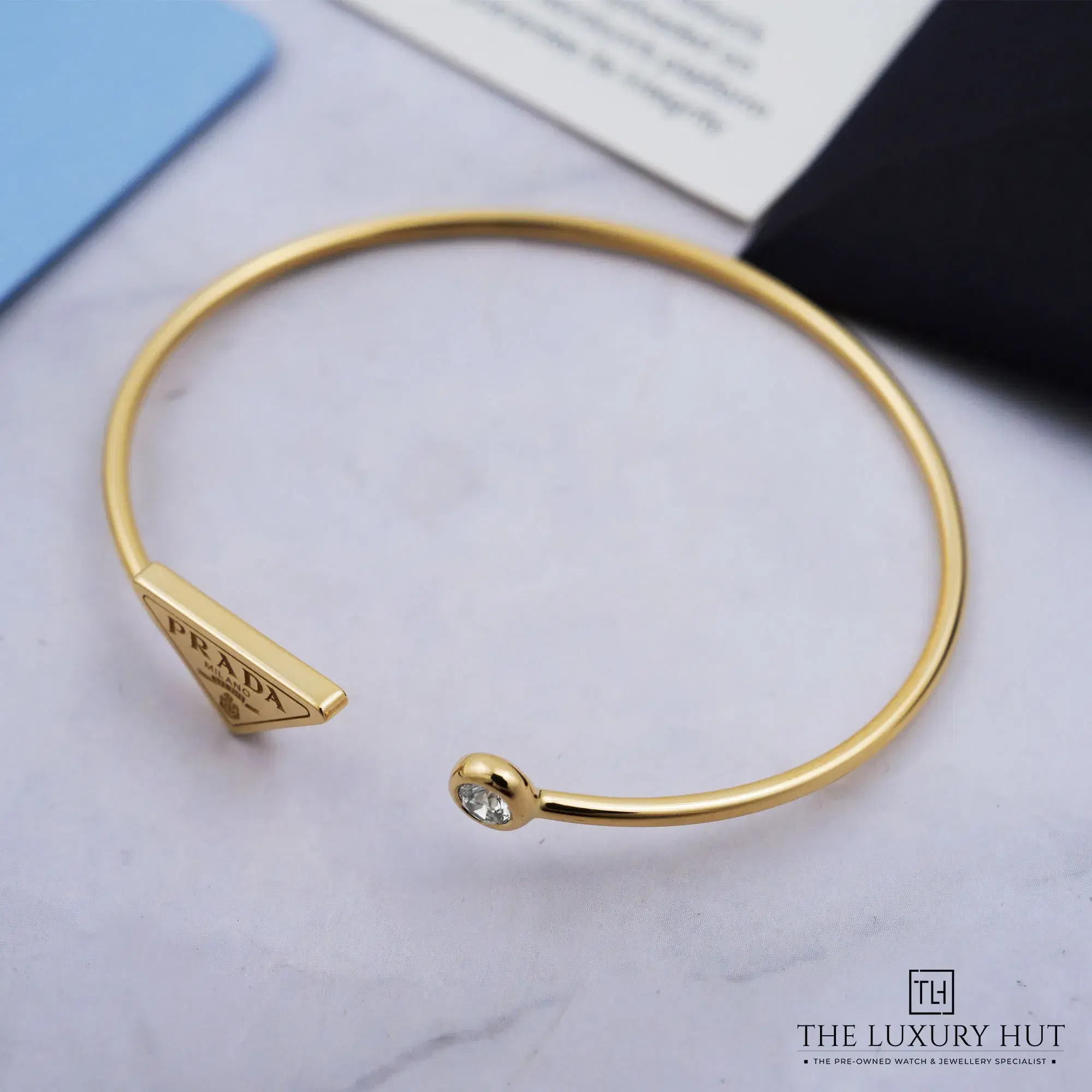 2026/10/4dc26b0a-0ff2-4f68-82e8-0efd8cf2e516Prada_Eternal_Bangle_Bracelet_Yellow_Gold_LB1071-b.jpg.webp
