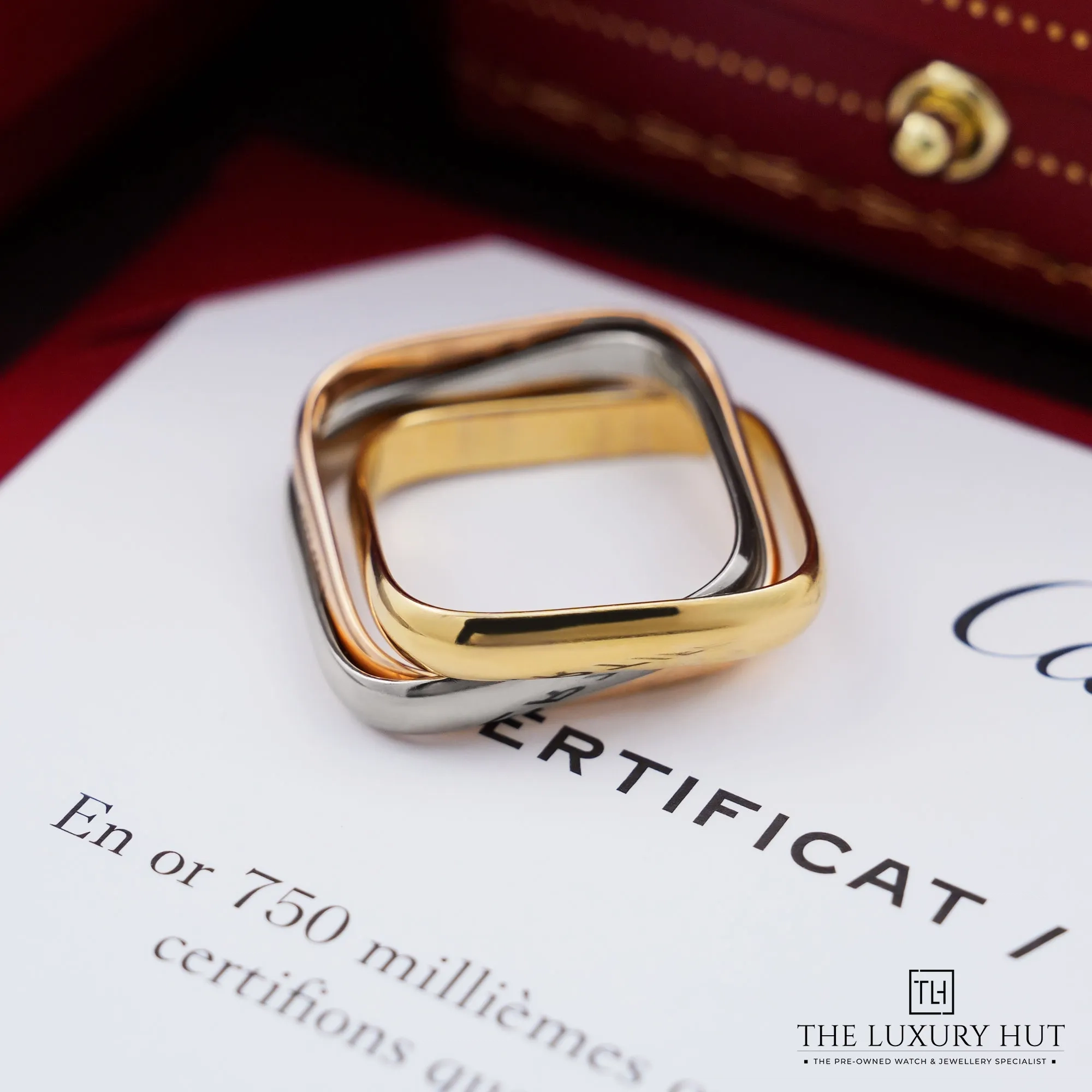2026/10/676a8c05-ea35-413c-abe3-4b36705a56b6Cartier_Trinity_Cushion_Gold_Ring_53481-b.jpg.webp
