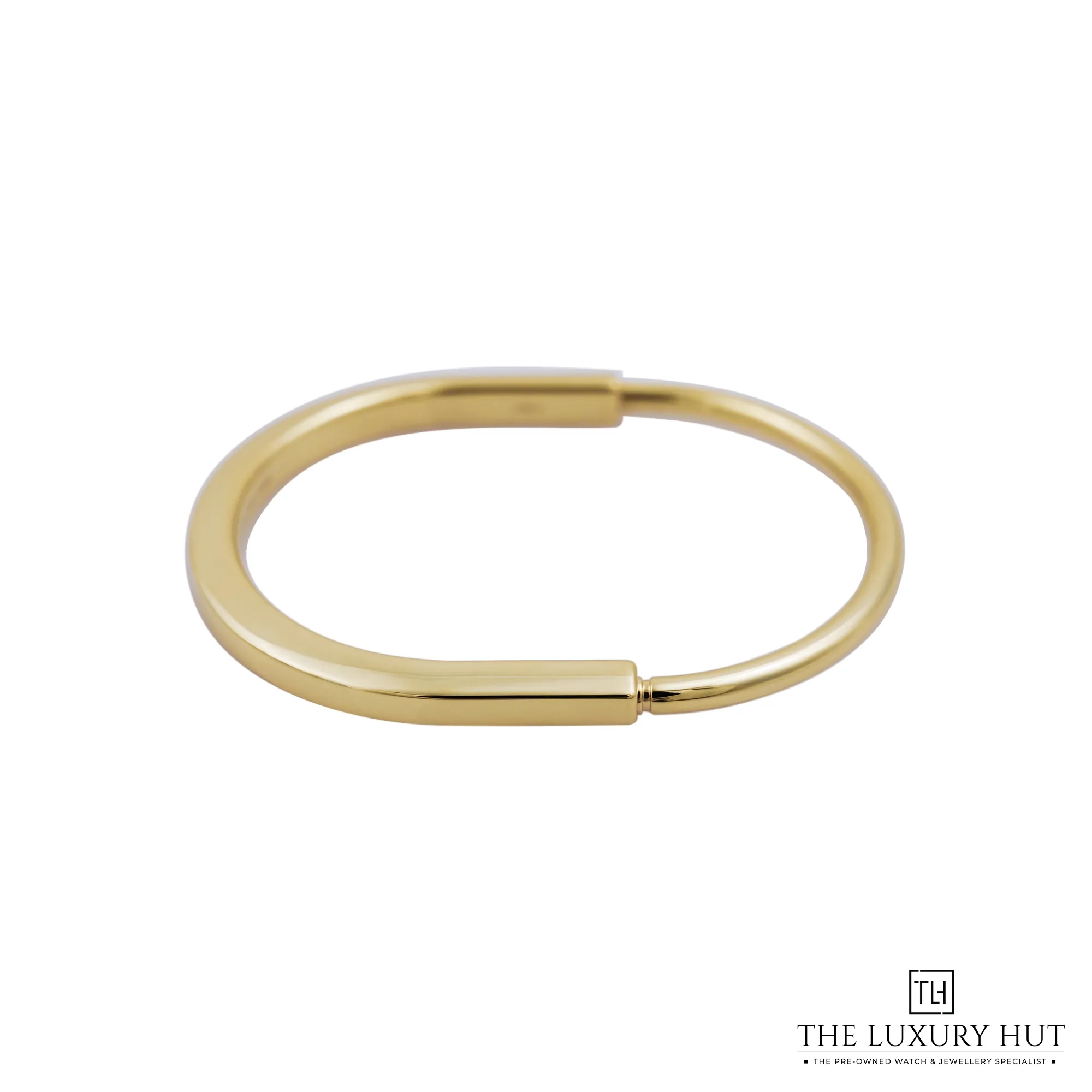 2026 10 c9e8f590 7a87 4346 b2f9 9e5631438bf2Tiffany Yellow Gold Lock Bangle 53484 a jpg webp