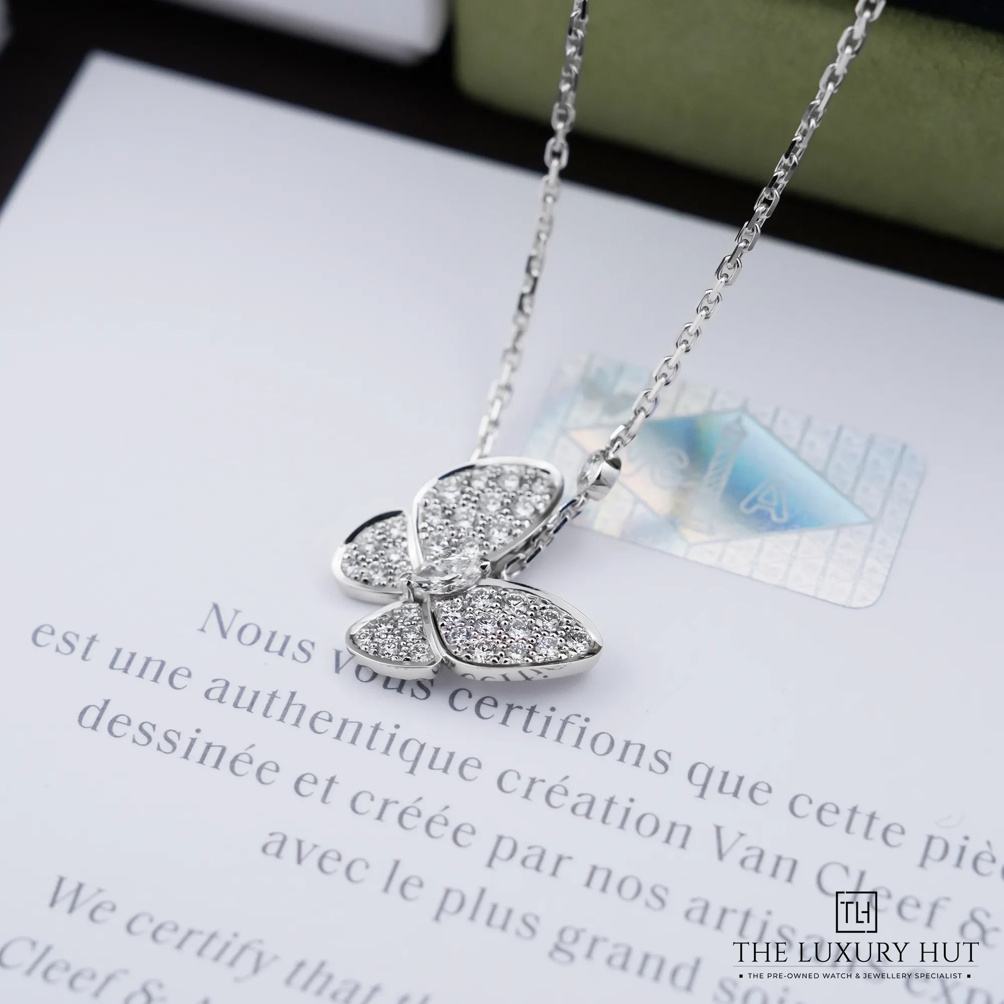 2026/10/cca541b9-9556-4b37-8a08-814444e03127Van_Cleef_&_Arpels_Two_Butterfly_Gold_Diamonds_Pendant_Necklace_53498-c.jpg.webp