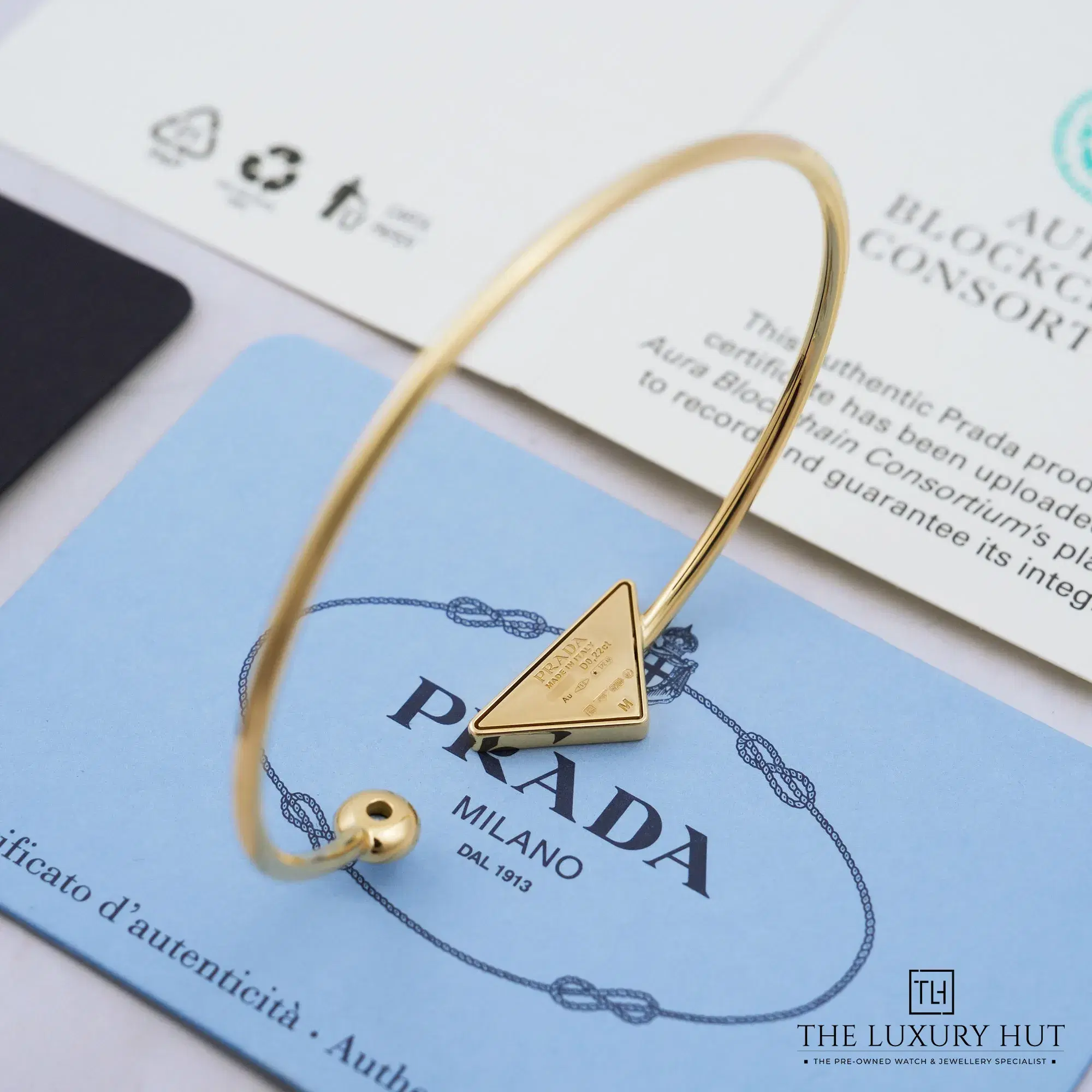 2026/10/d2c0339f-2f37-4064-ab13-19b762d1e205Prada_Eternal_Bangle_Bracelet_Yellow_Gold_LB1071-c.jpg.webp