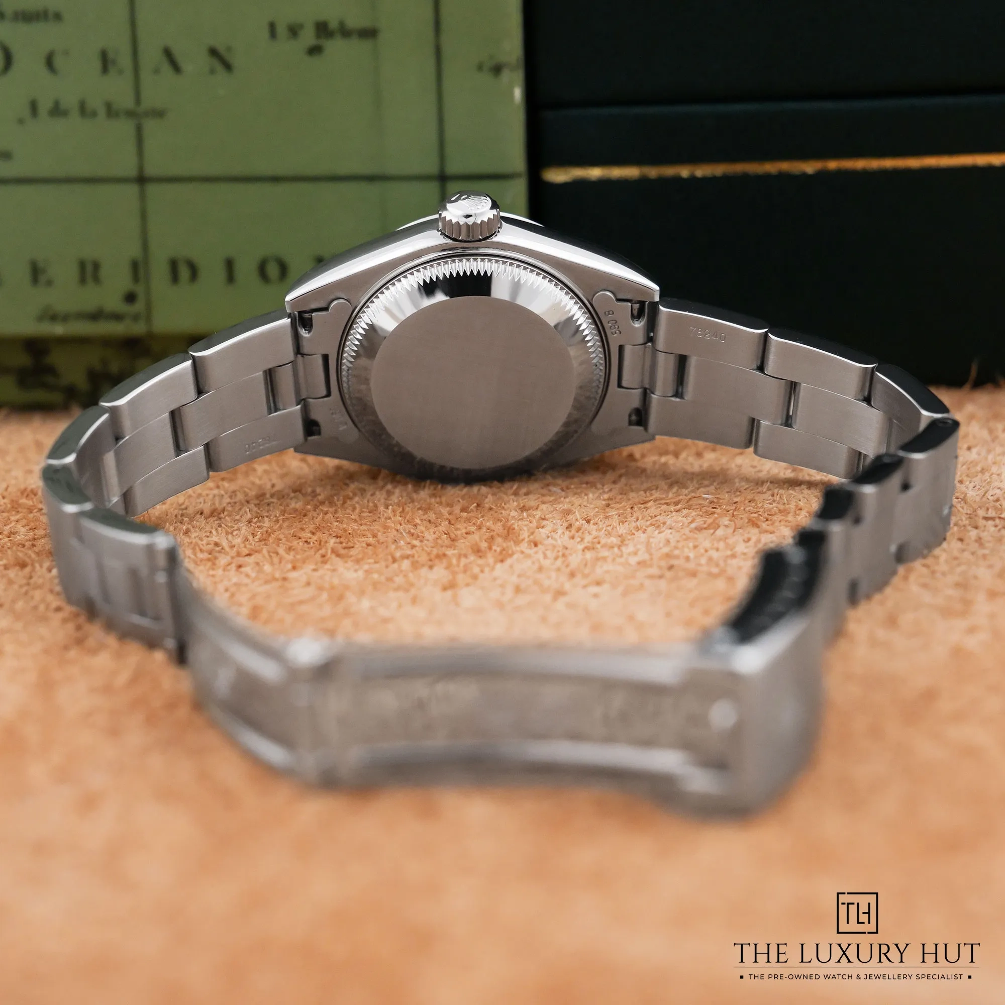 2026/10/e31ae520-53f9-4d86-917f-7632116c6d41Rolex_Oyster_Perpetual_Date_Steel_26mm_White_Dial_LB1040-d.jpg.webp
