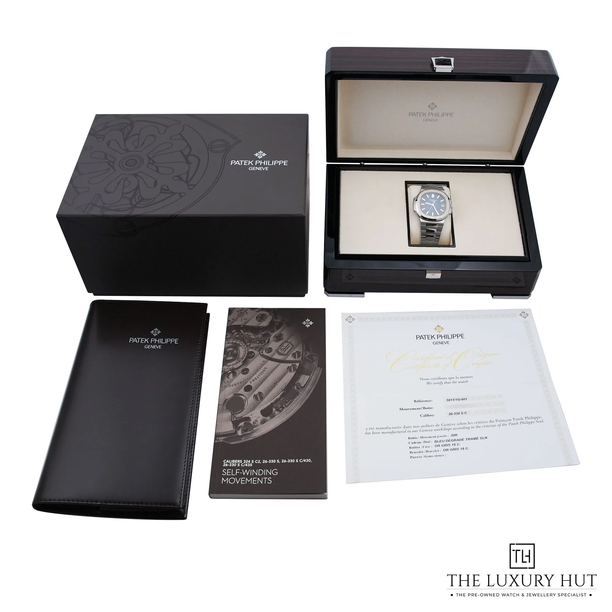 2026/10/e825fcd5-3d7c-40bb-8039-97fd92b39f8bPatek_Philippe_Nautilus_White_Gold_Blue_Dial_53514-f.jpg.webp