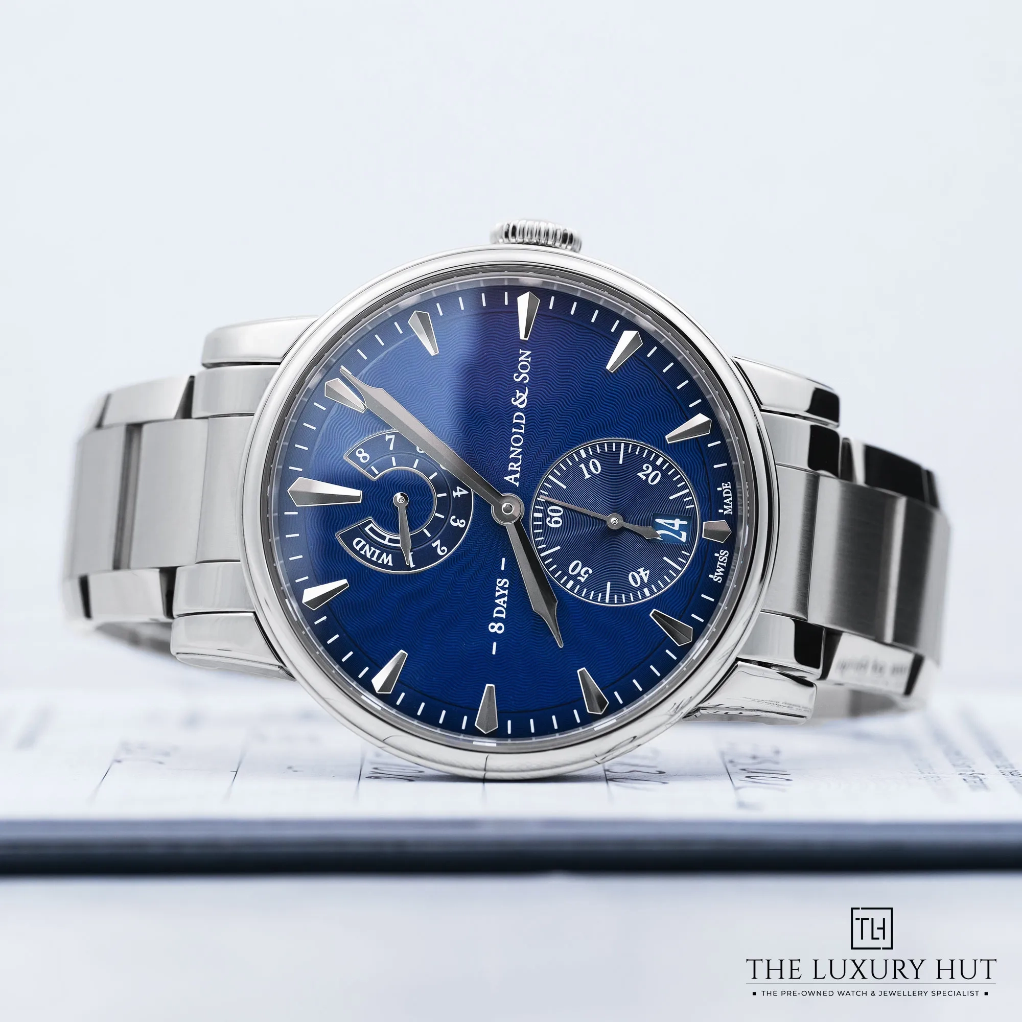 2ff0c5c0-cca9-48de-a816-b4eec2724a56Arnold_Son_Eight-Day_Steel_43mm_Blue_Guilloche_LB753-e.webp