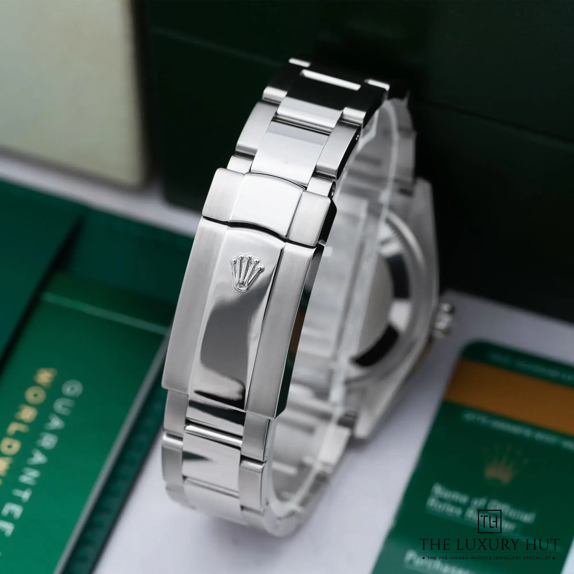 645466c2-bf9f-486a-adbf-2861152012b1Rolex_Oyster_Perpetual_Date_Steel_34mm_Blue_52385-d.webp