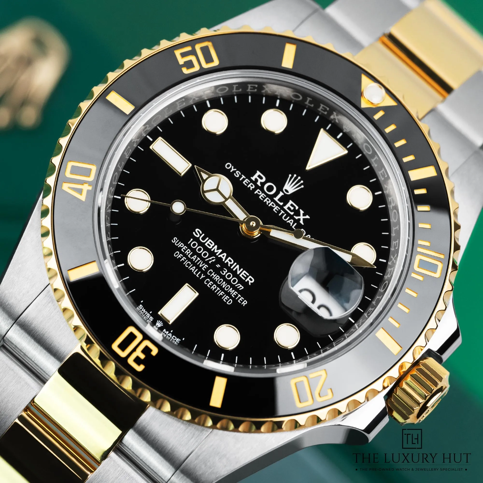 6b93667d-36d3-4f59-8d49-fa838a5c1694Rolex_Submariner_Date_41mm_Bi-Metal_Black_52462-d.webp