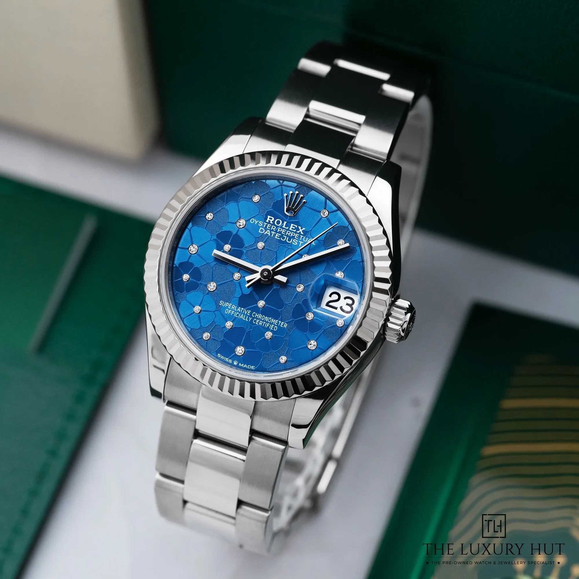 92cb683f-db22-42ec-ace7-d2765dc56336Role_Datejust_31_Azzurro_Blue_Floral_Motif_Diamond_52313-b.webp