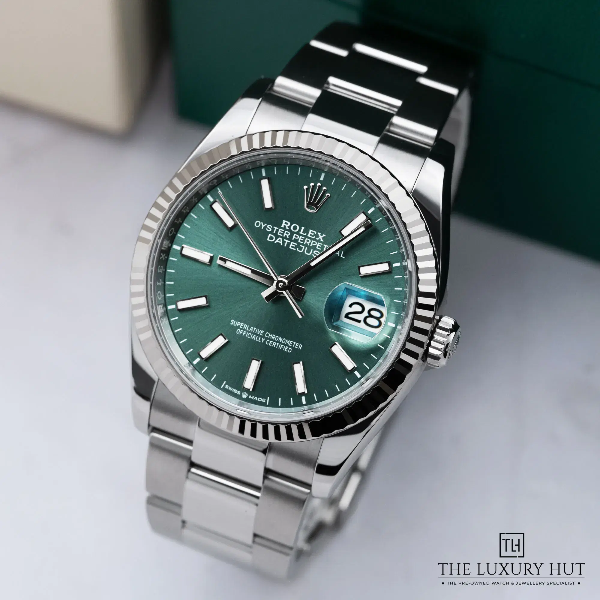 9da6098a-c85e-4dad-8a47-1ba8a26eb5adRolex_Datejust_36mm_Steel_Mint_Green_Dial_52070-b.webp