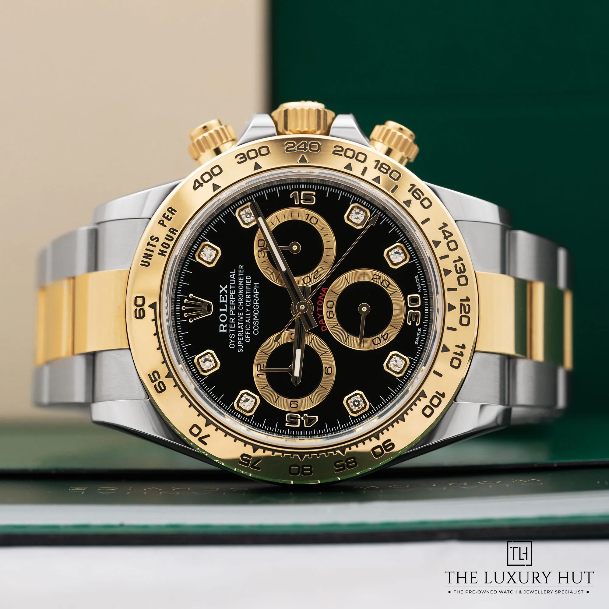 a292f0e5-346e-4e00-ae16-413bc7aeddbbRolex_Daytona_Steel_Gold_40mm_Black_Diamond_Update_52438-c.webp