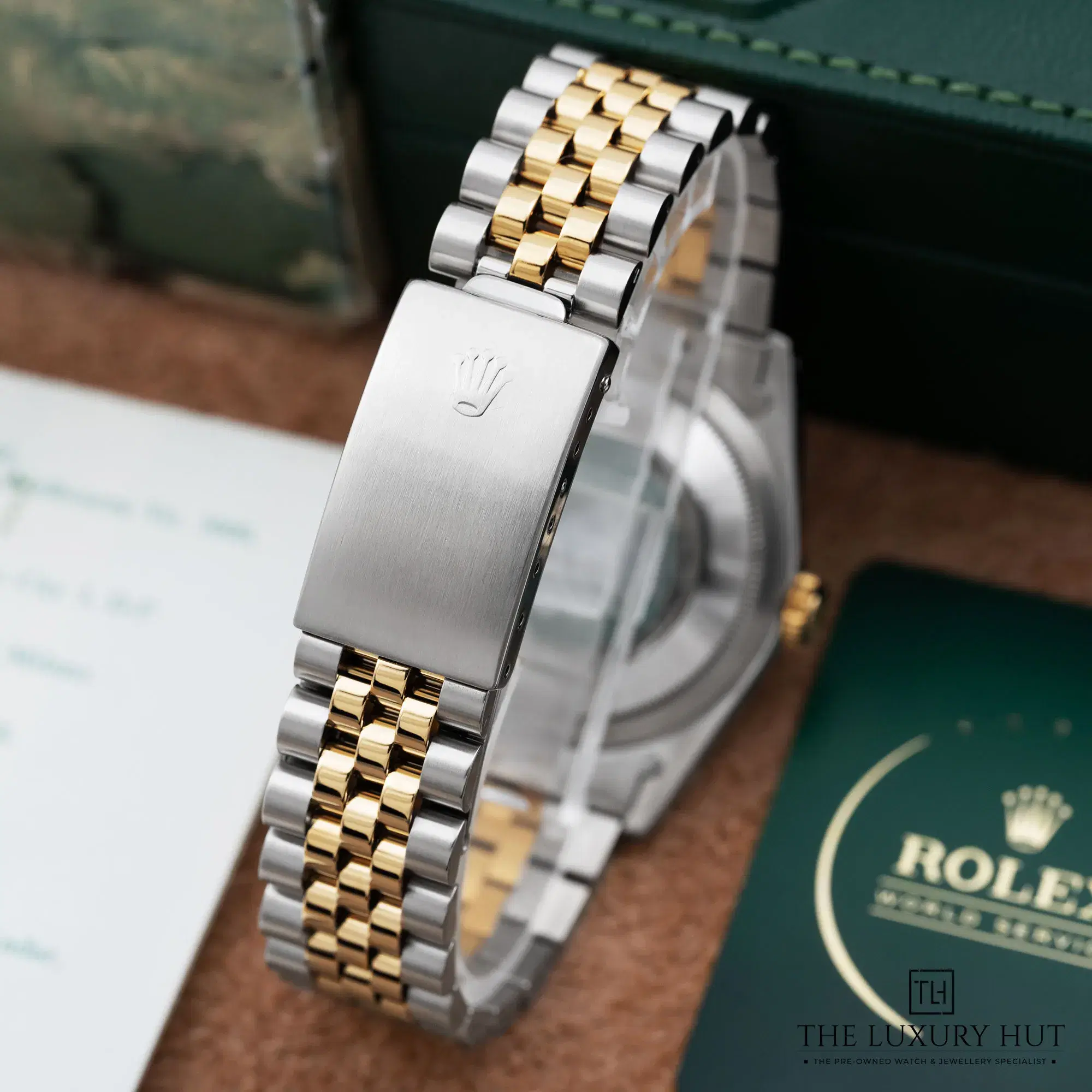 ac3f4e06-2f3a-45bc-8aaf-810a3d758fafRolex_Datejust_36_Steel_Yellow_Gold_Silver_Dial_52405-d.webp