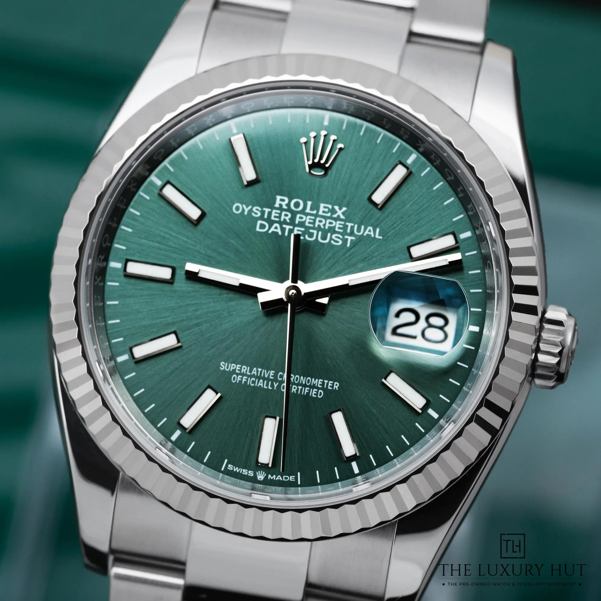 ae66aab2-3f0a-4646-9608-ac4b0795d4feRolex_Datejust_36mm_Steel_Mint_Green_Dial_52070-e.webp