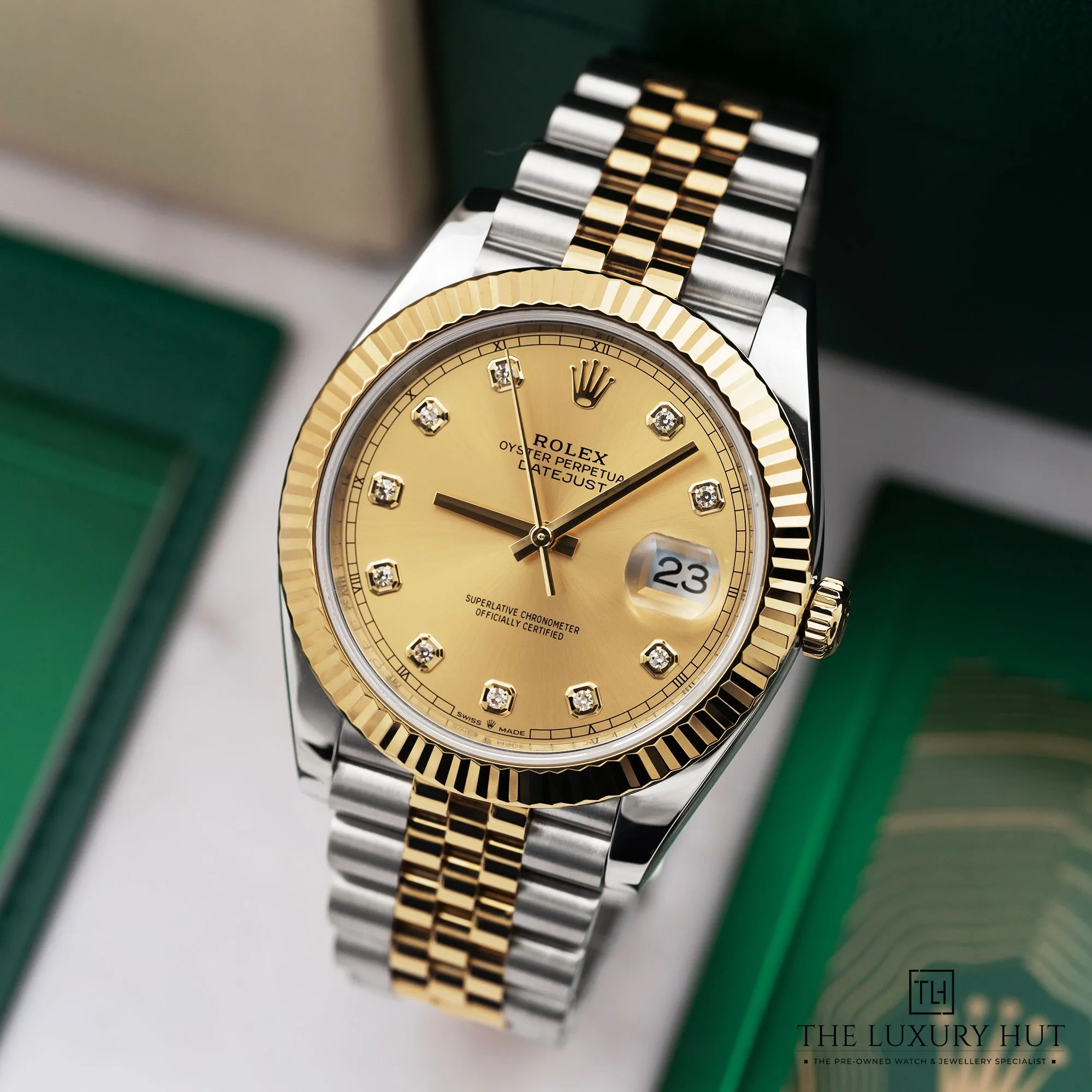 c2254062-9f02-440c-9ba8-9ab5ffeaf482Role_Datejust_41_Champagne_Diamond_Dial_51870-b.webp