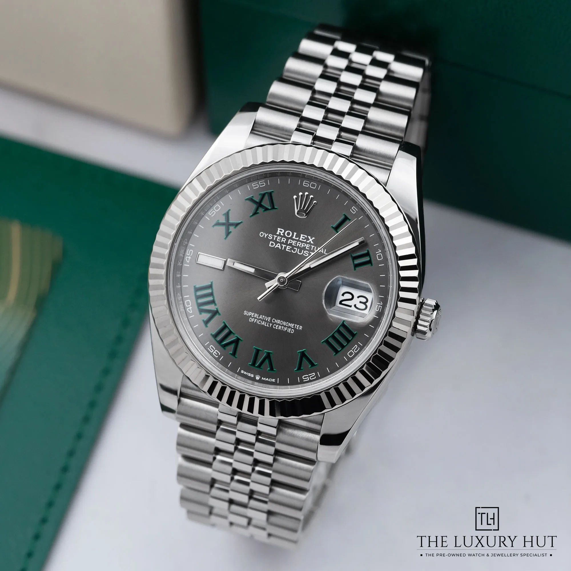 d0c61b80-0b13-481c-9a8e-fe0b58fe05eaRolex_Datejust_41mm_Slate_Wimbledon_Dial_52390-b.webp